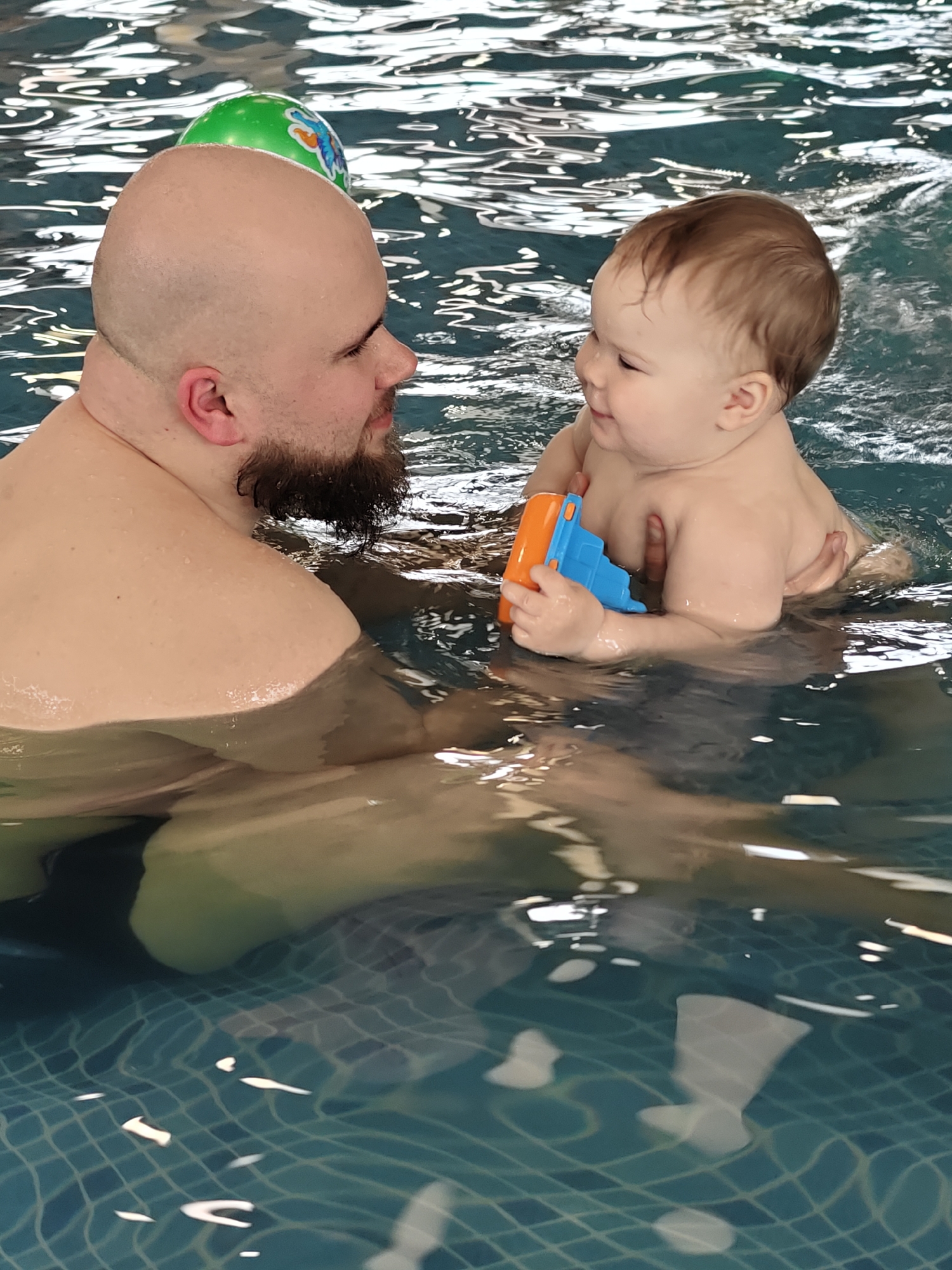 Family enjoys swimming session at indoor pool in Votkinsk