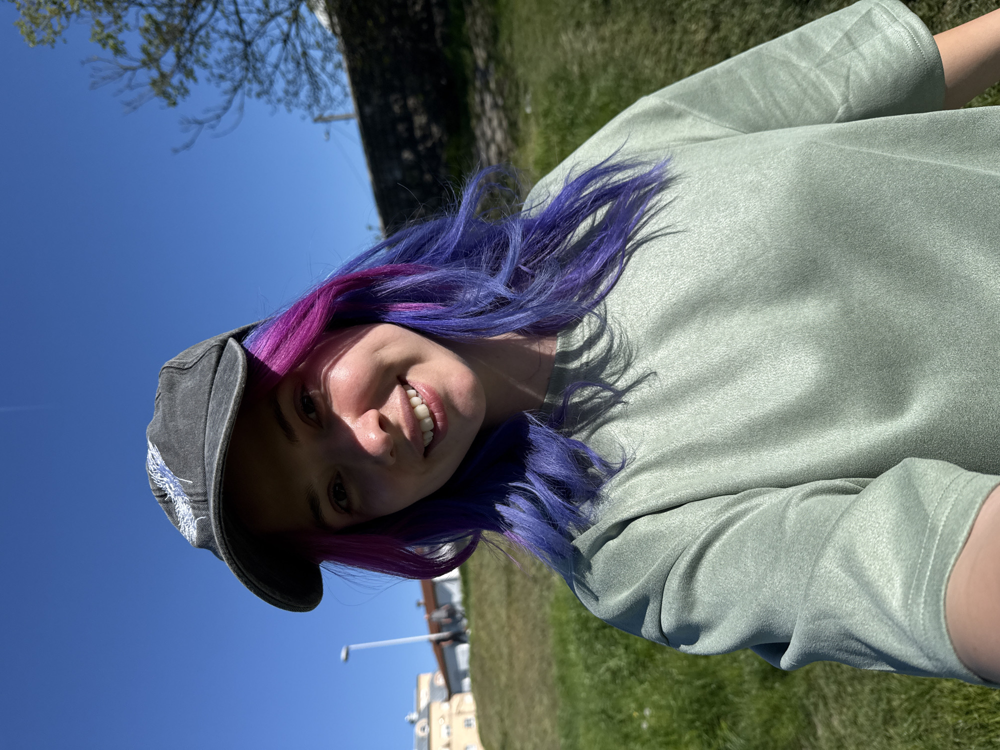Young woman documents sunny afternoon outing in Zagreb with selfies