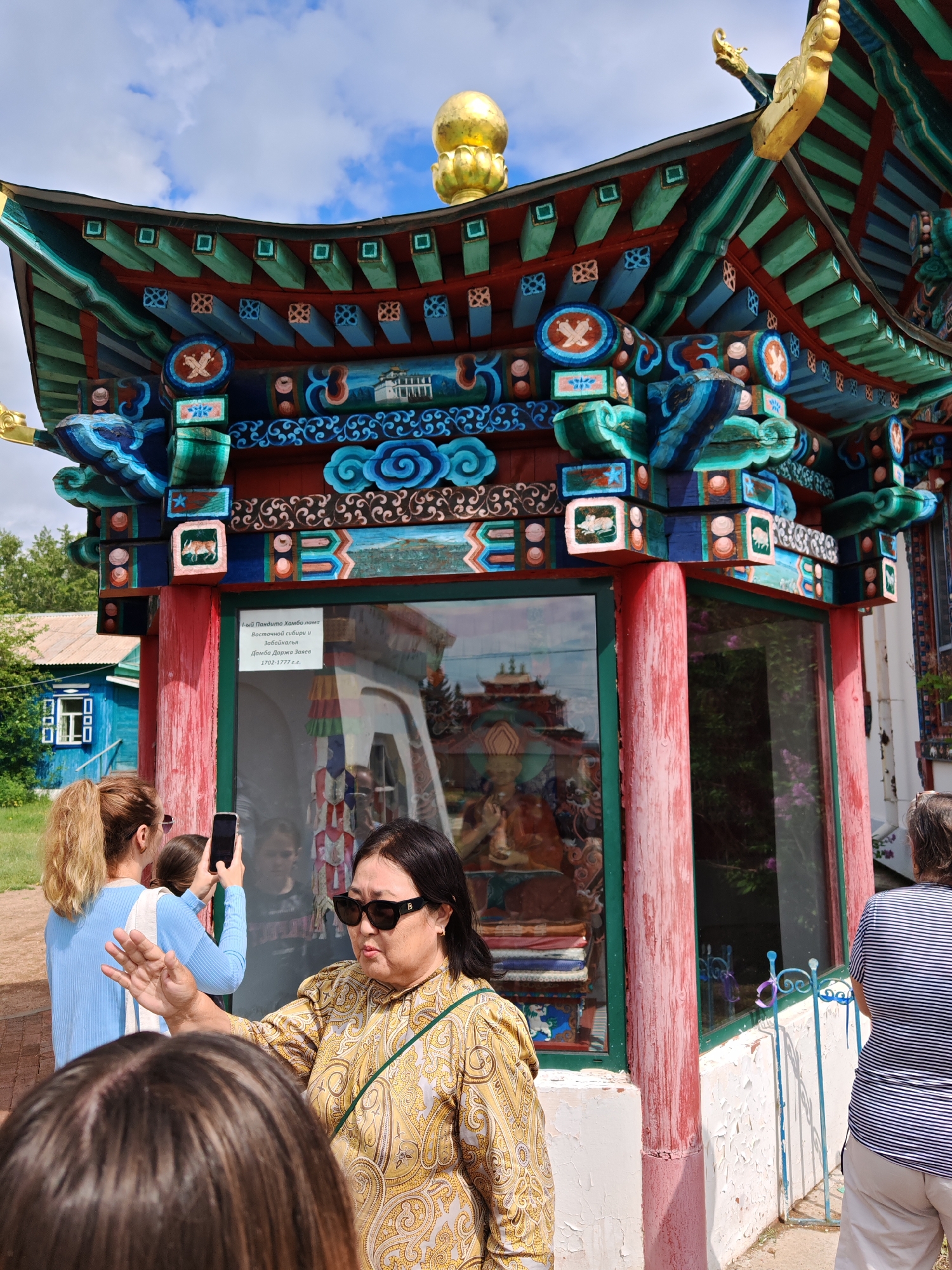 Colorful Buddhist temple complex explored across multiple angles