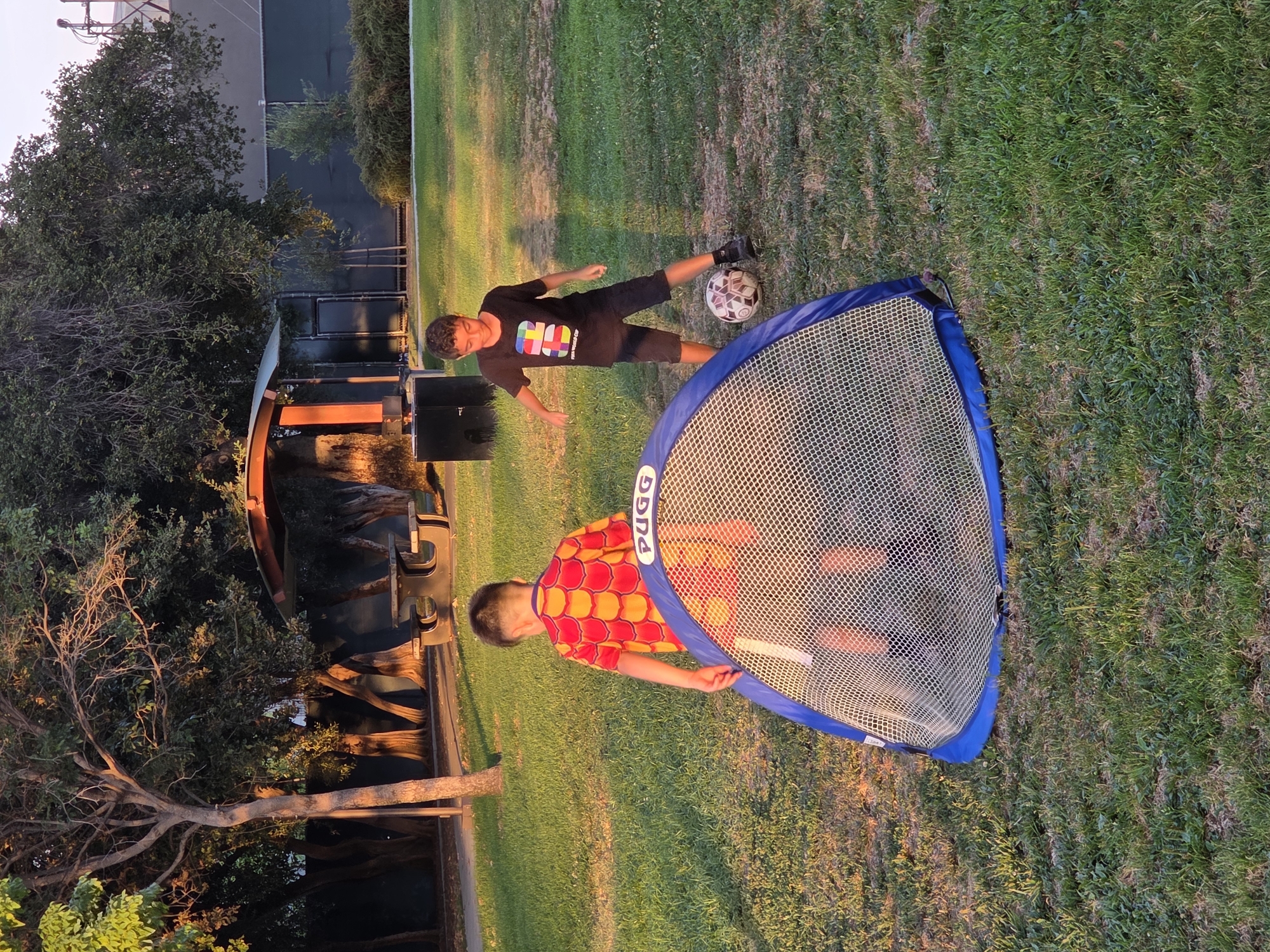 Kids playing at a Glendale park on a summer evening