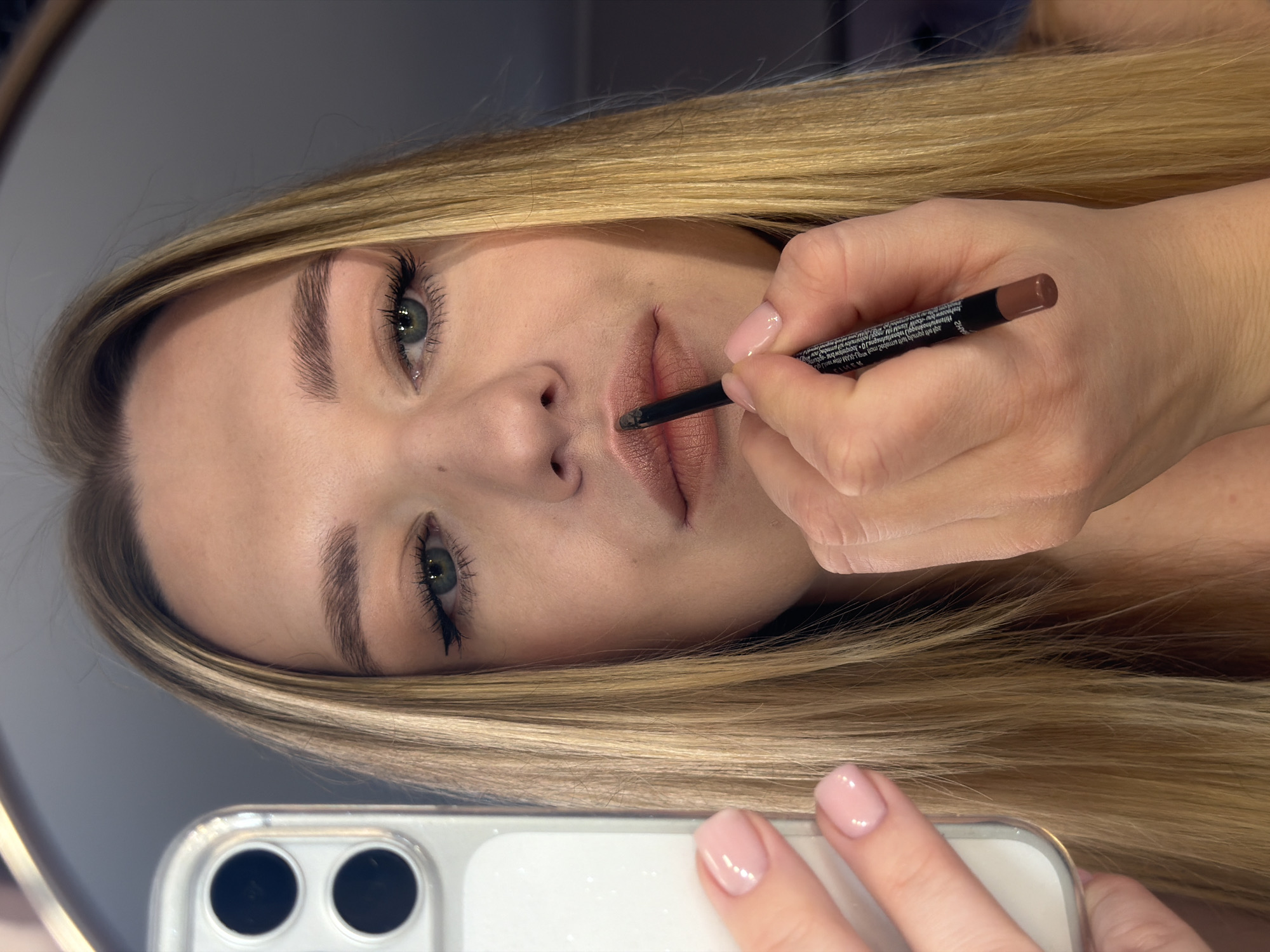 Woman's morning beauty routine captured in Dreiliņi, Latvia