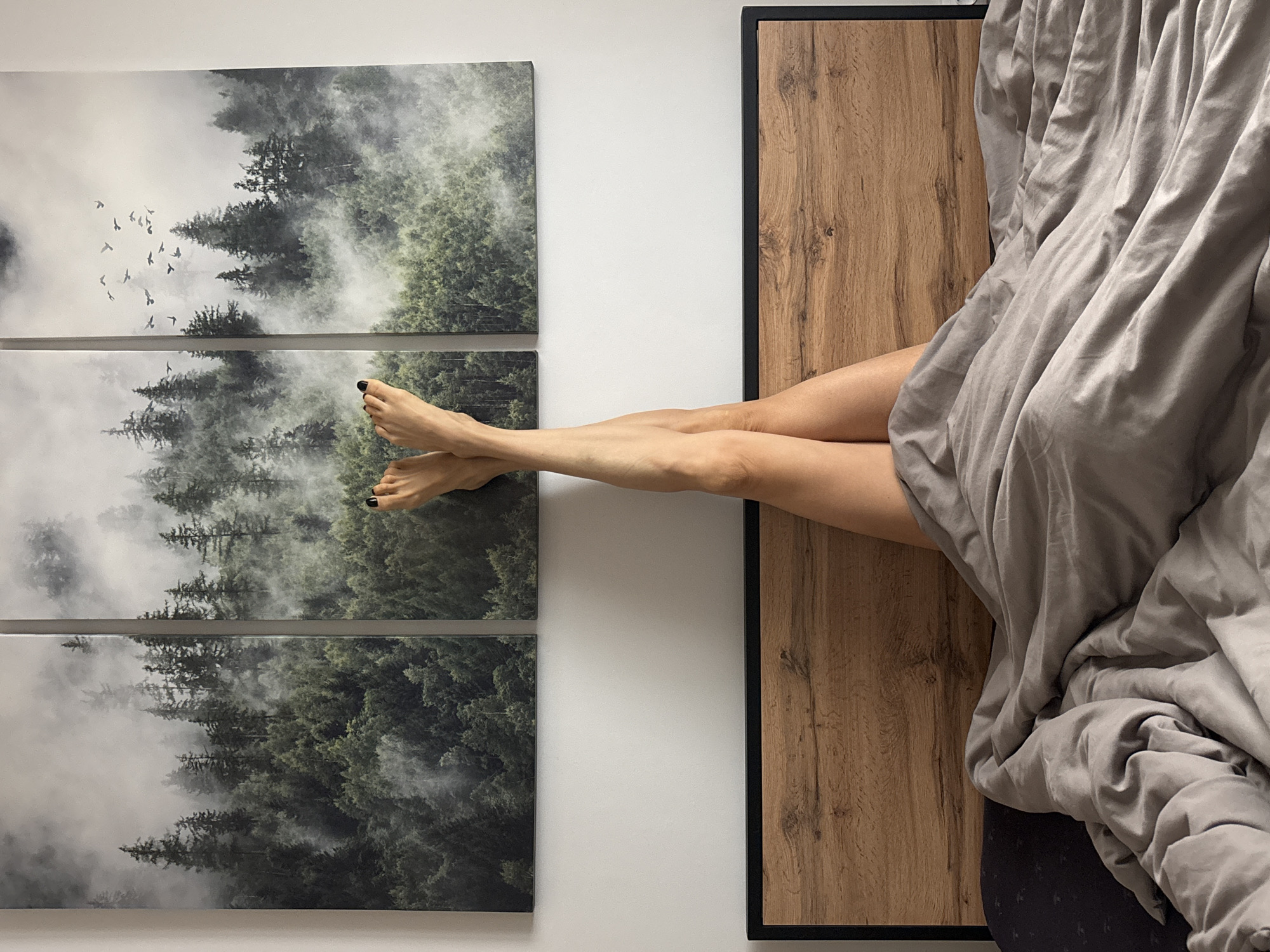 Person resting in bedroom during early morning hours