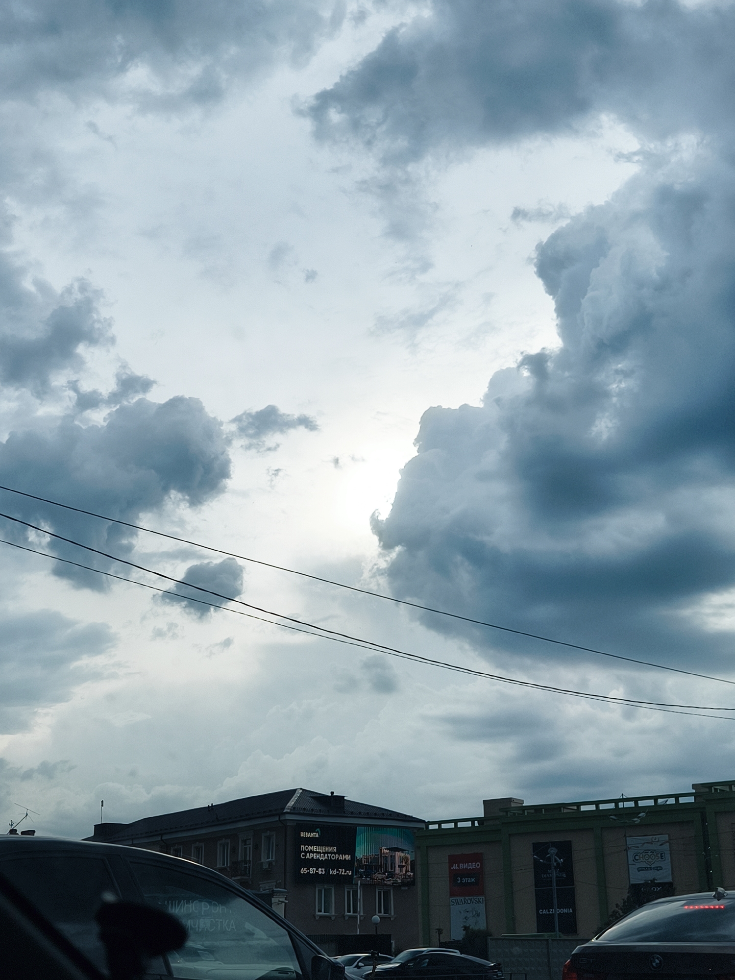 Cloudy skies observed over Tyumen street scene