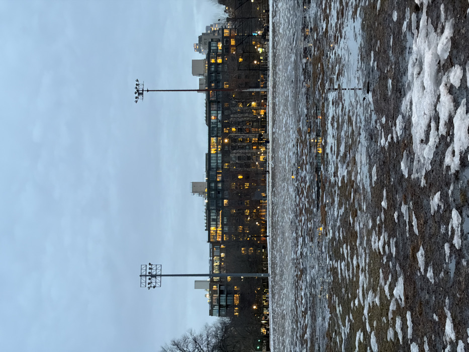 Dusk cityscape with melting snow documented in New York