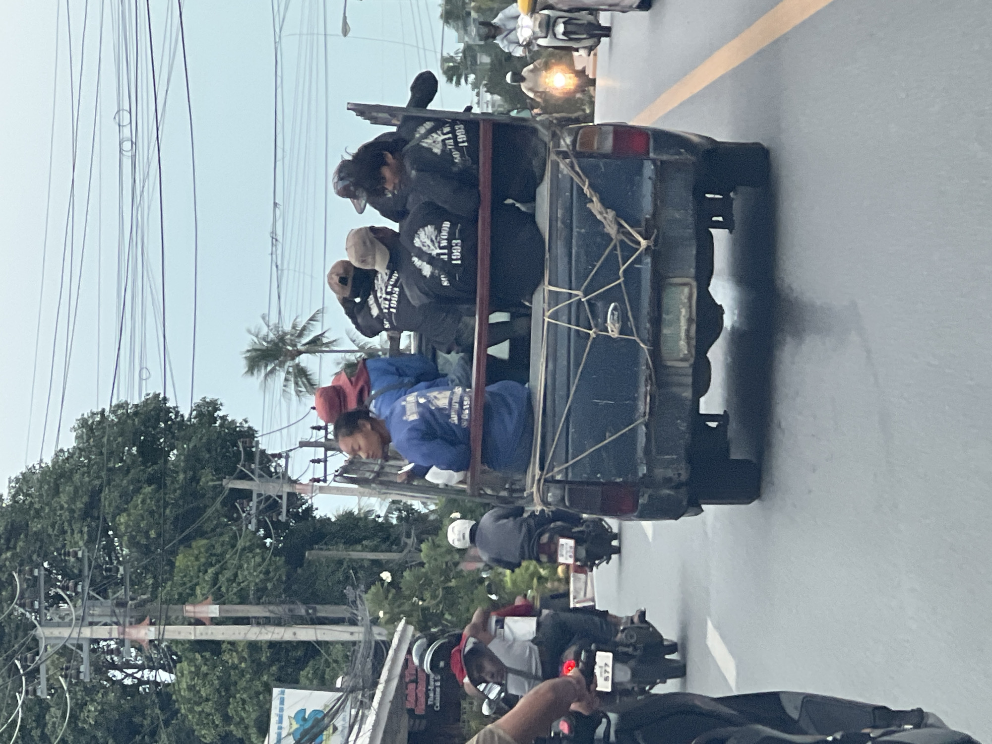 Pickup trucks and mixed traffic flow through Ko Samui streets