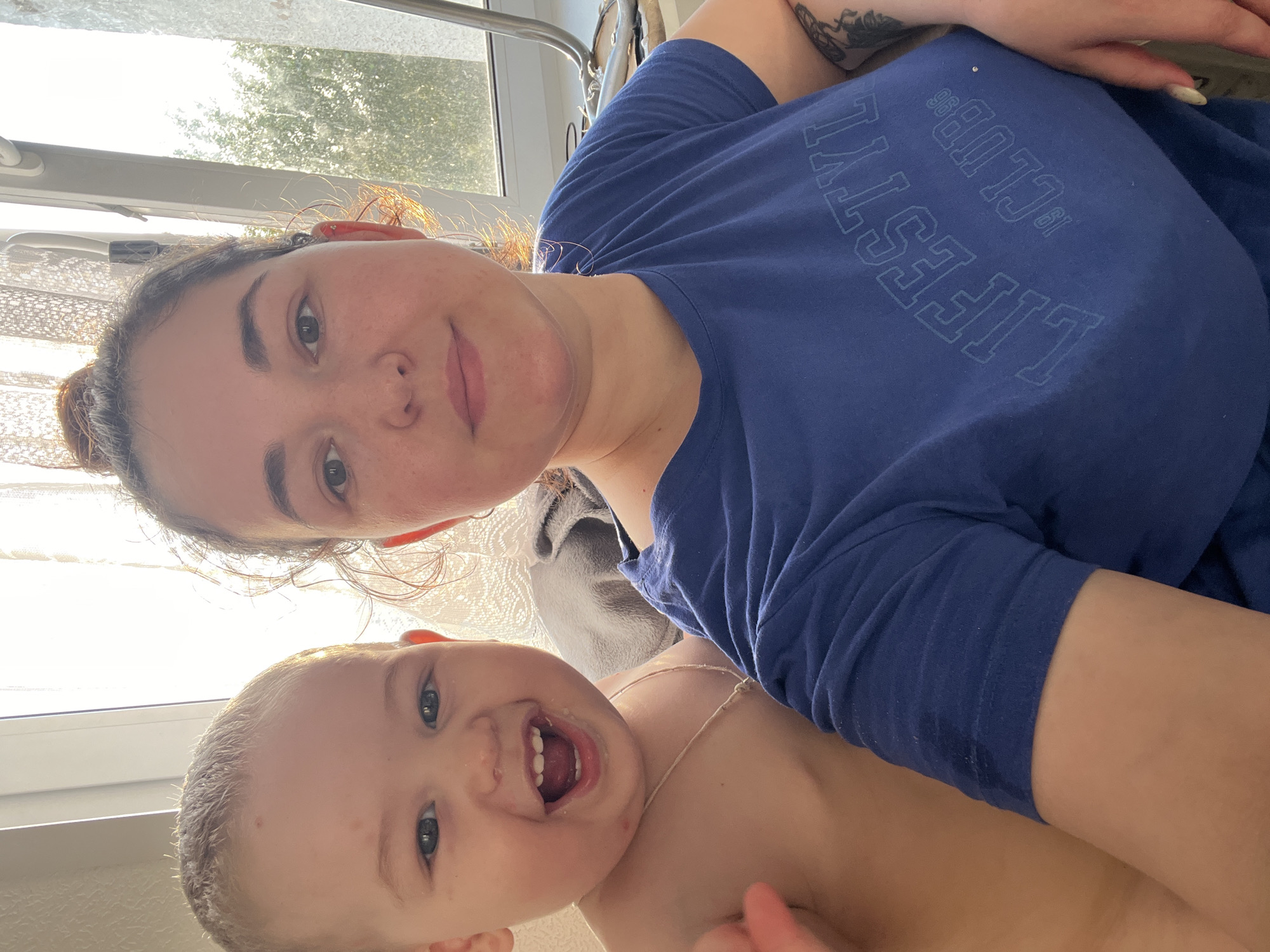 Sunny afternoon stroll with a toddler through Chelyabinsk streets