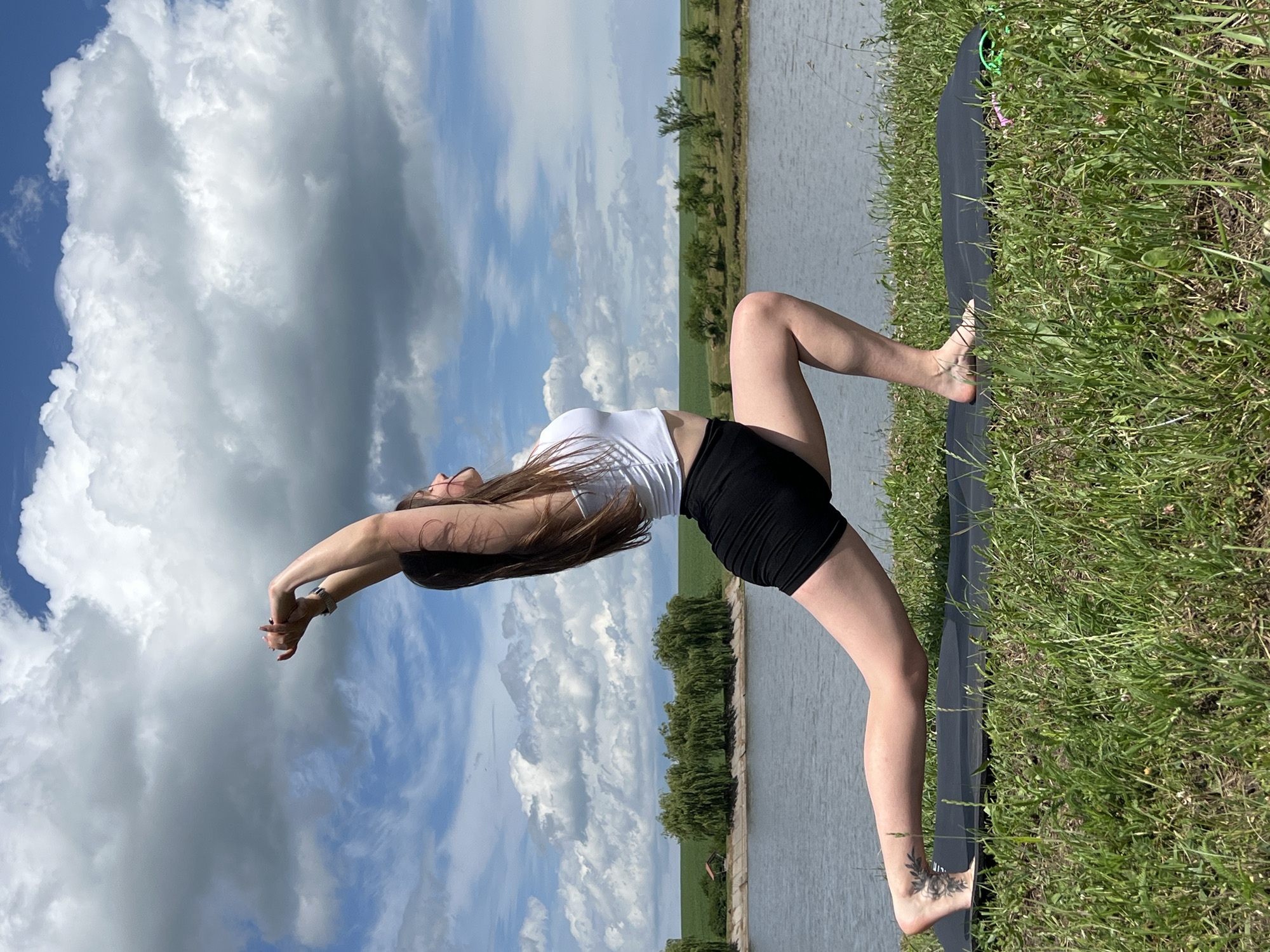Morning yoga and fishing session by Ukrainian lake