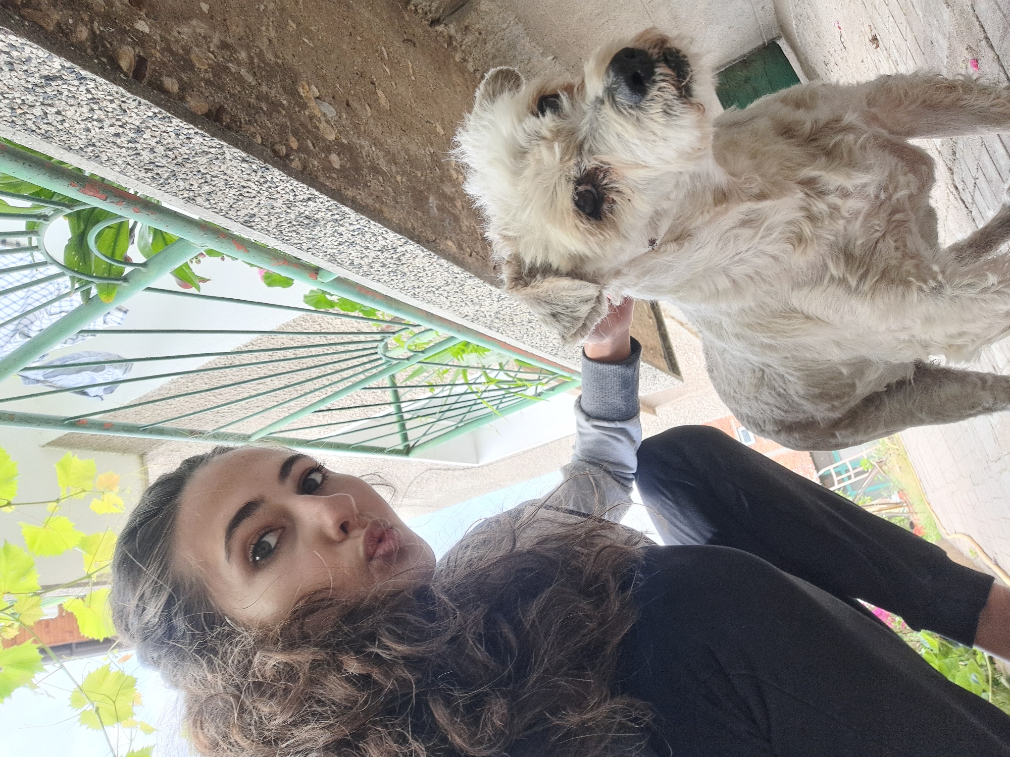 Woman's casual day captured in selfies with pets