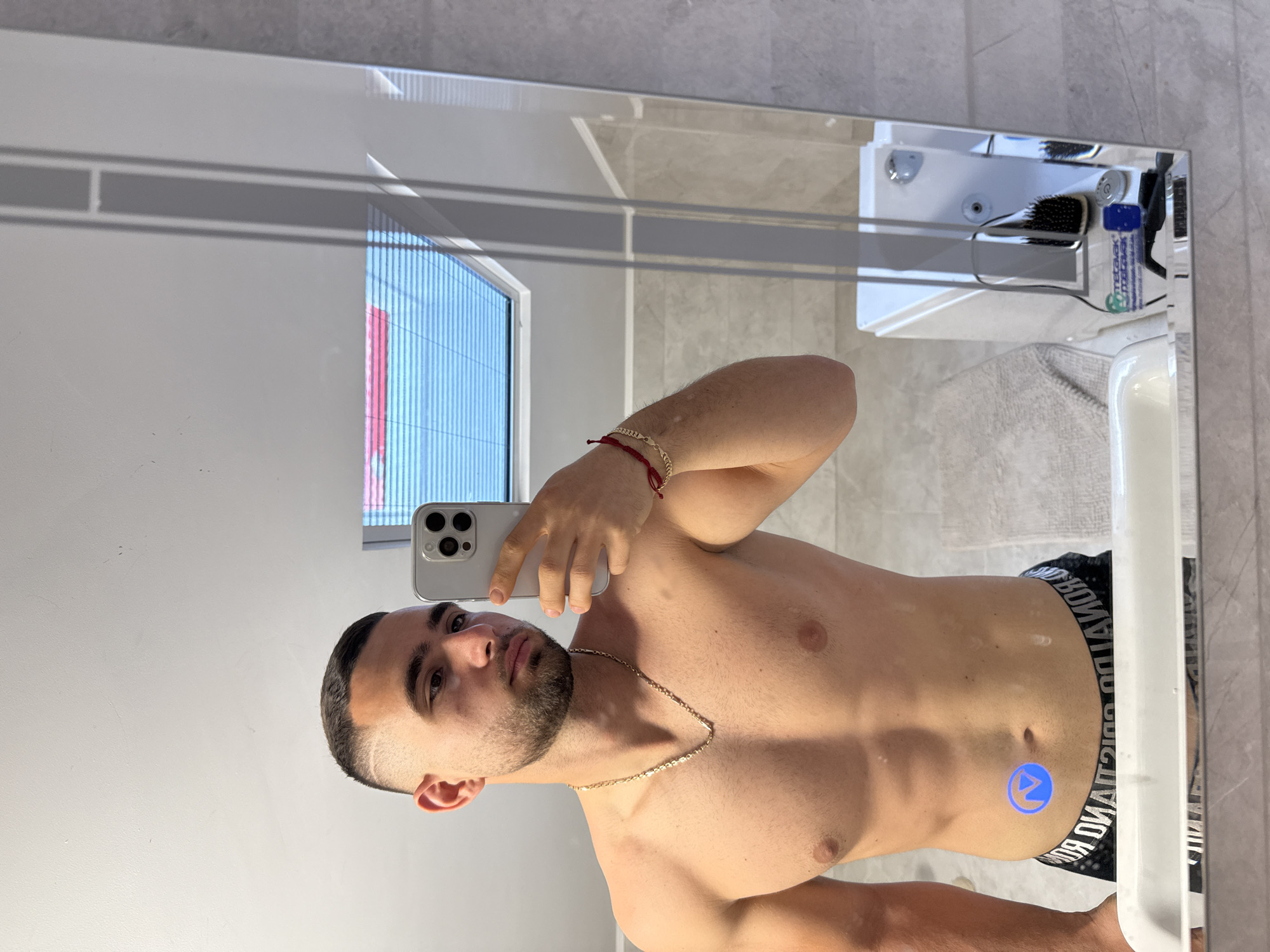 Man takes bathroom mirror selfies in Gabrovo, Bulgaria