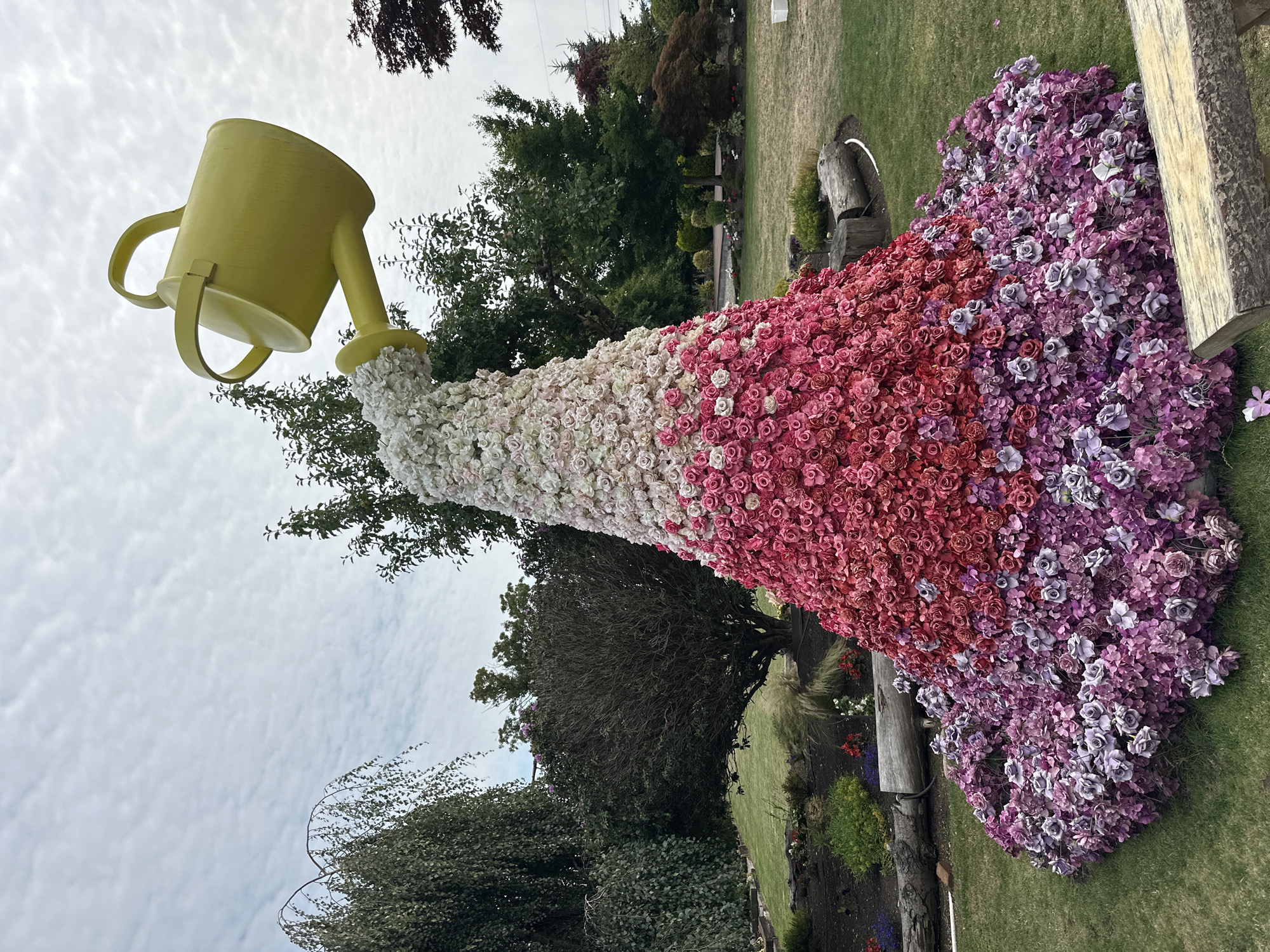 Sculptures, fabric art, and blooms at a Richmond garden
