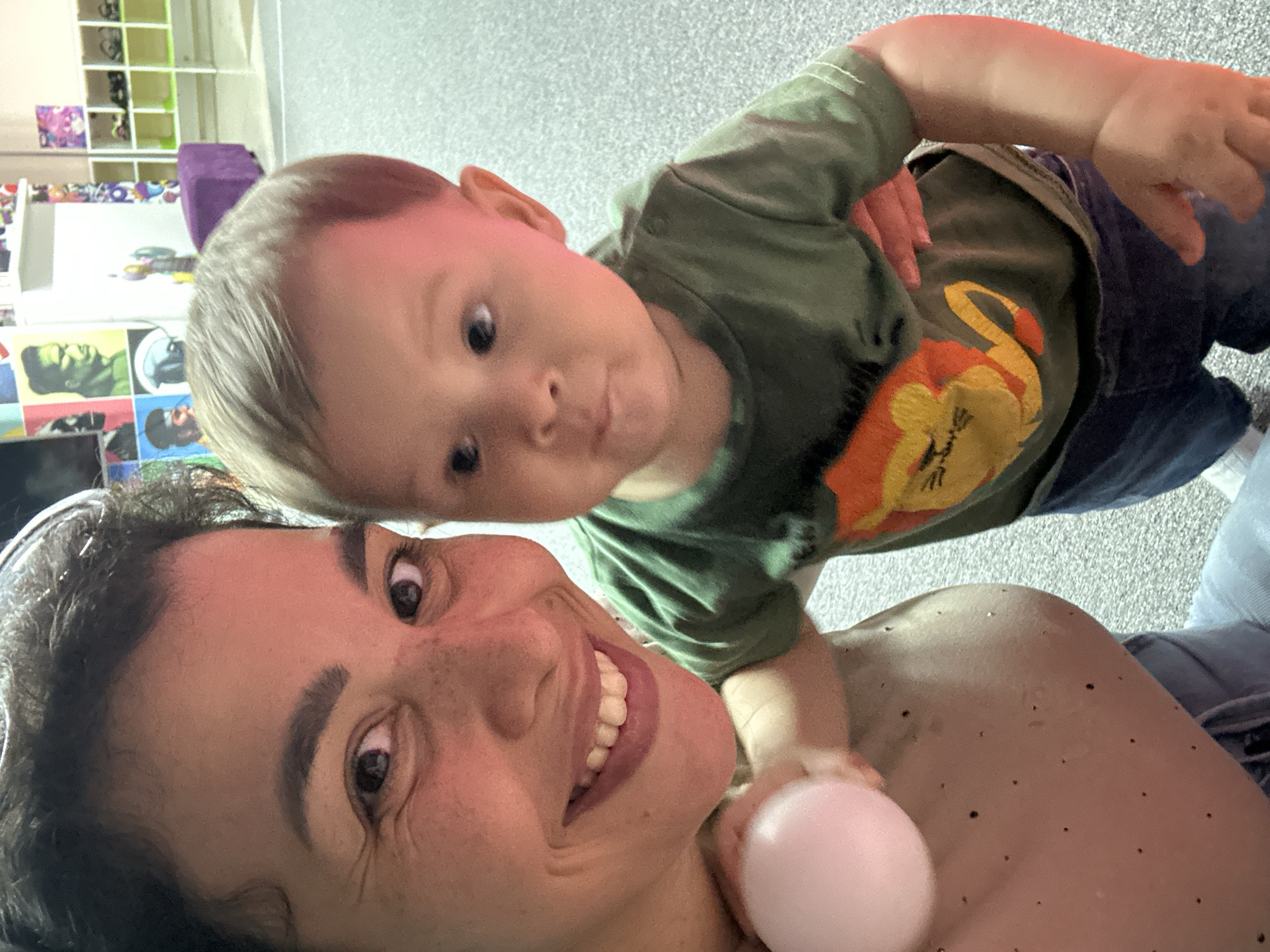 Toddler's morning at a colorful indoor ball pit play space