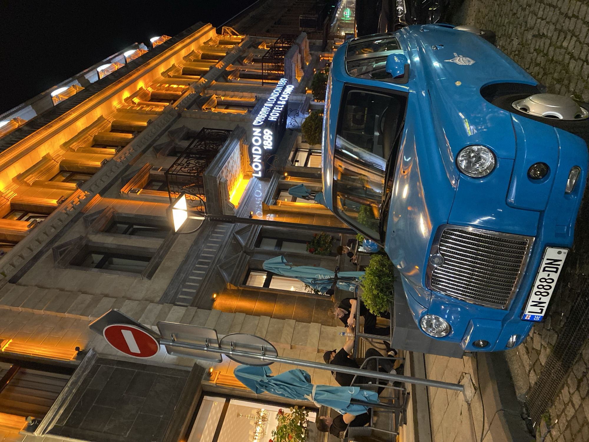 Batumi's lit-up streets and ornate facades on a summer night