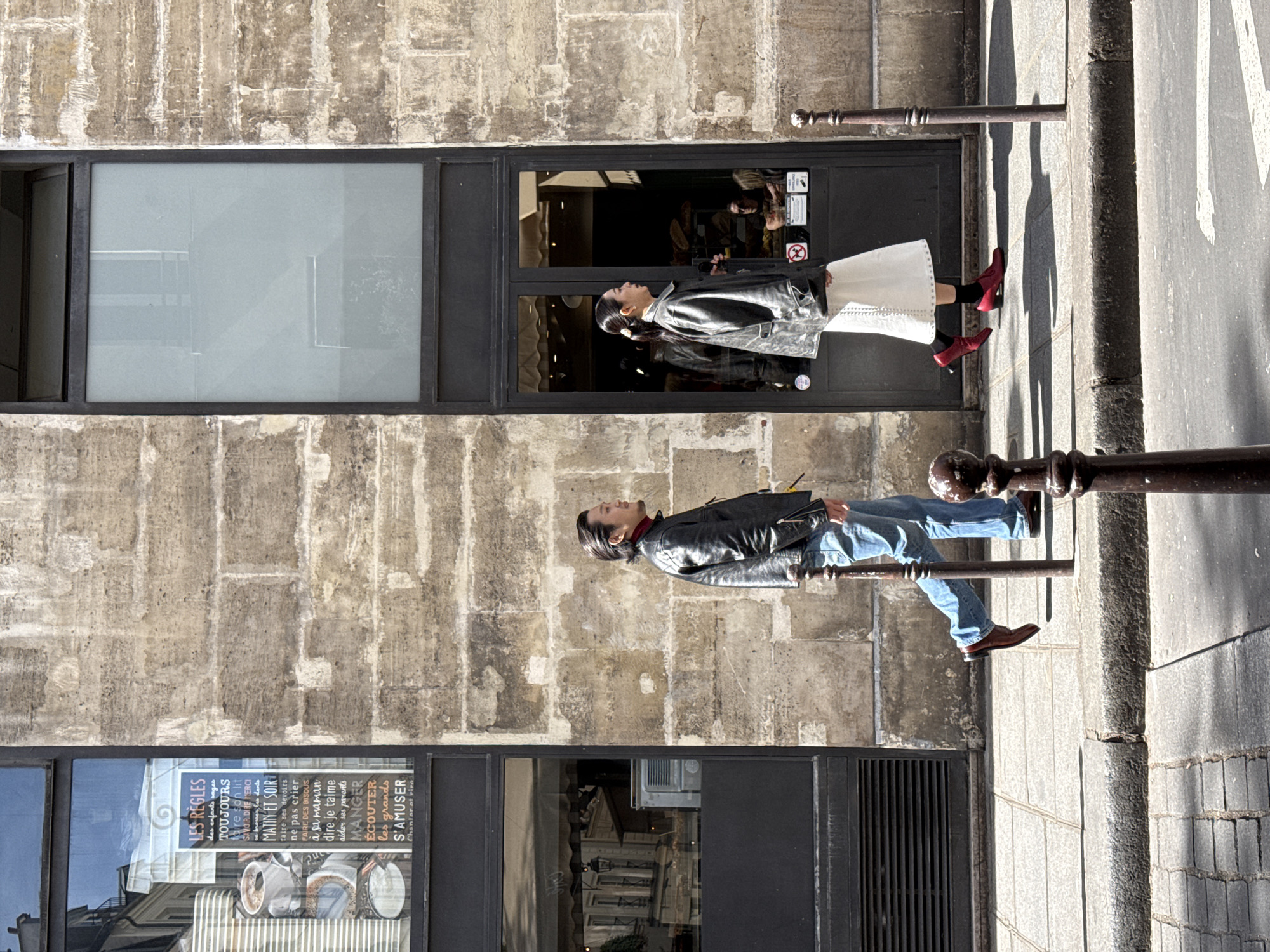 Couple in matching leather jackets spotted on Paris street railings
