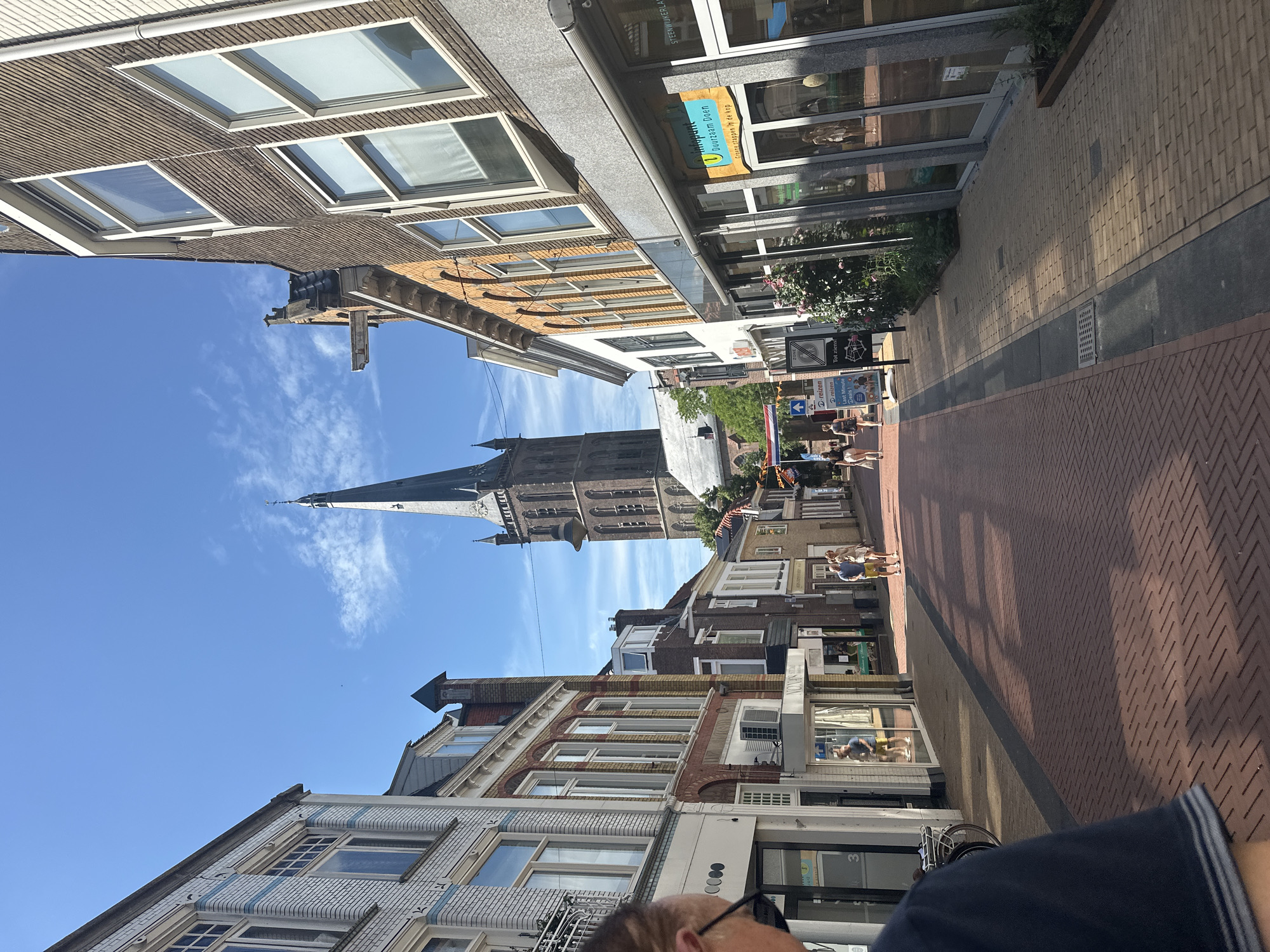Street-level afternoon in Steenwijk's brick-paved town center