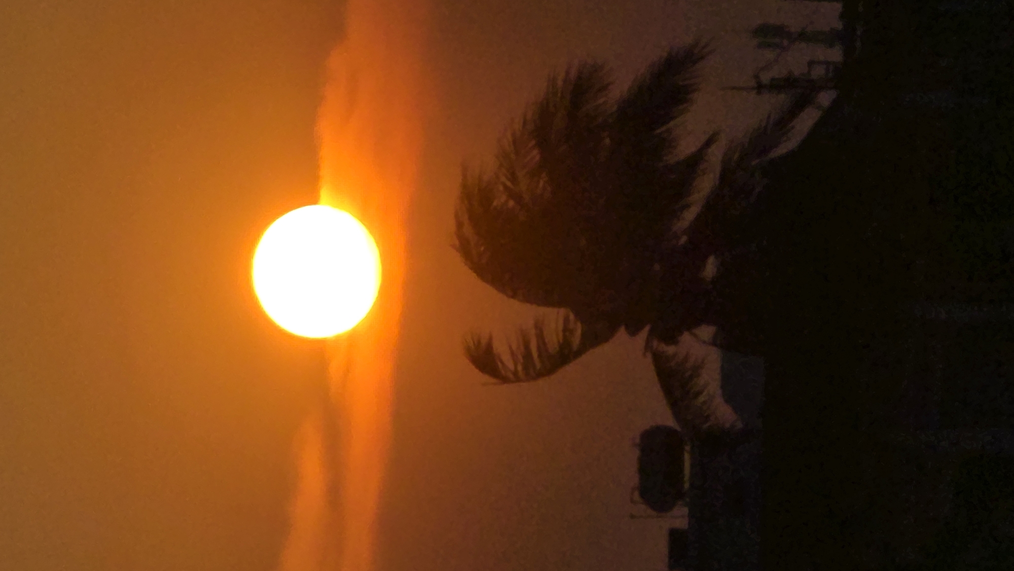 Orange sunset captured over Nha Trang waterfront