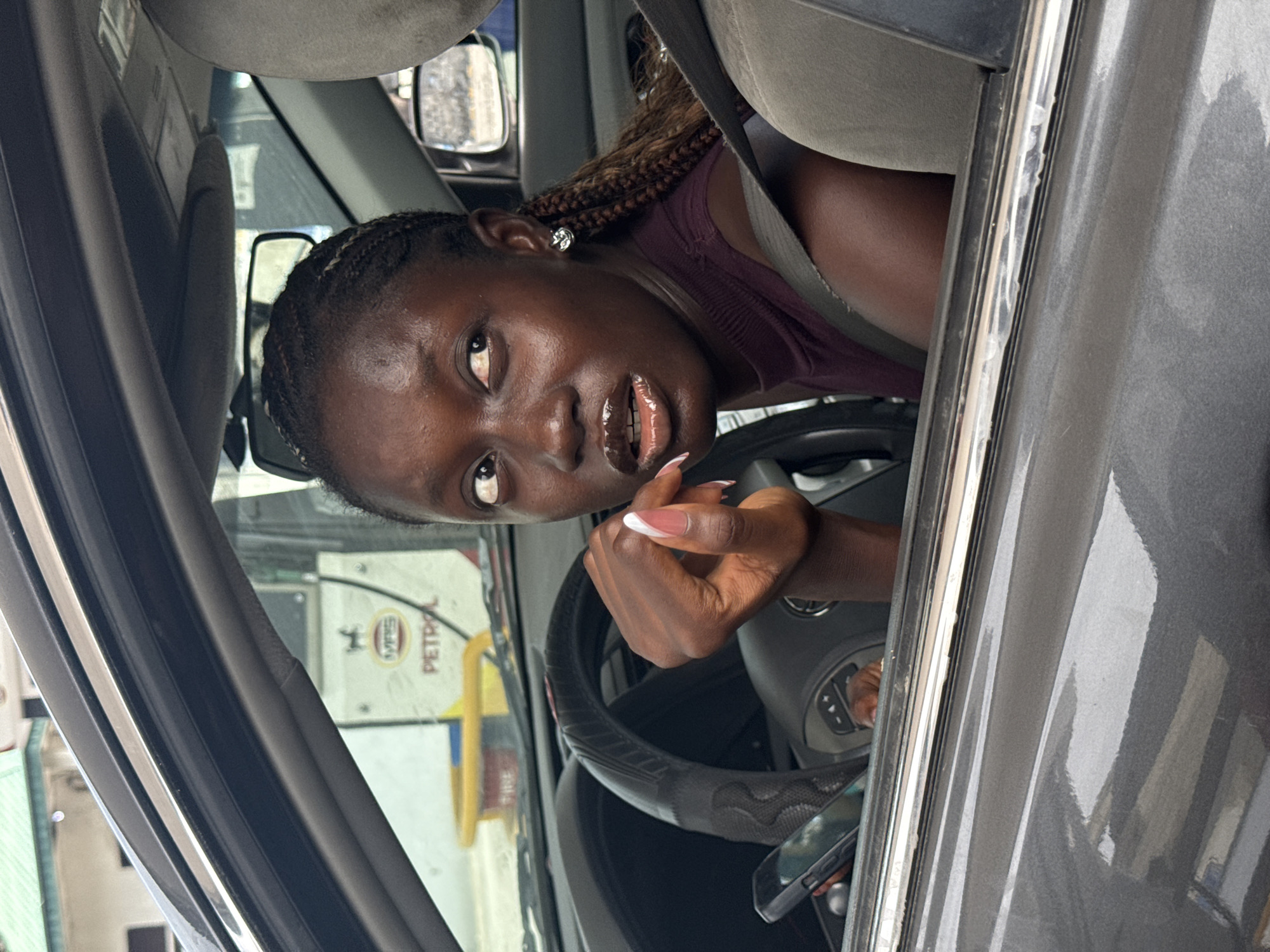 Waste collection and street activity in Ado, Nigeria