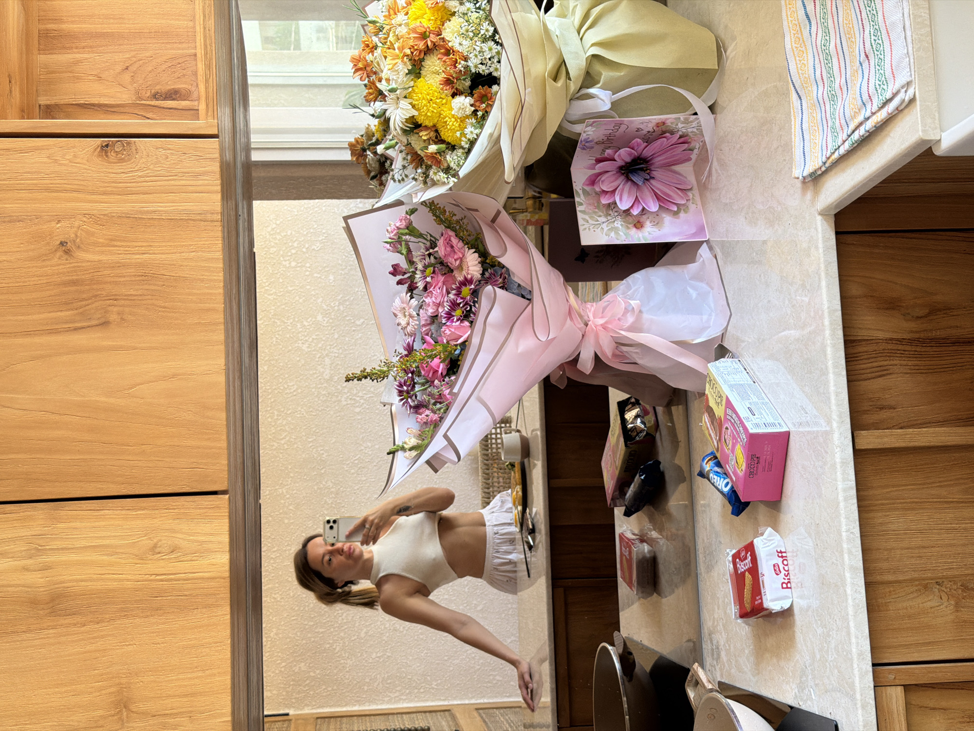 Woman documents early morning routine with flowers and breakfast in Mengwi