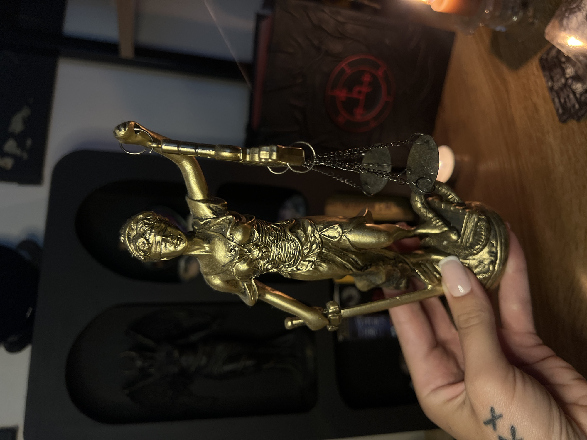 Occult altar objects, tarot cards, and a Yorkshire Terrier at home