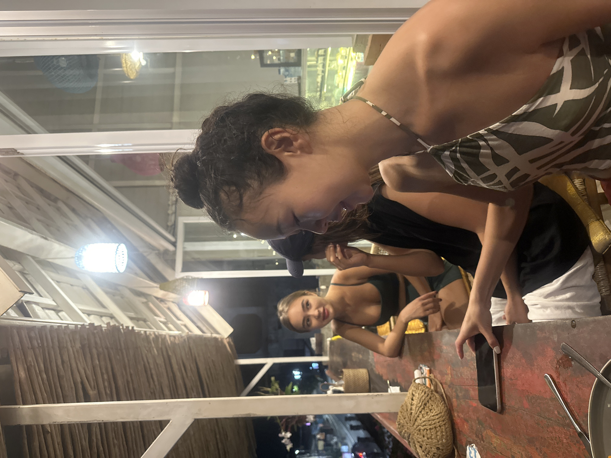 Women gather at outdoor restaurant in North Kuta