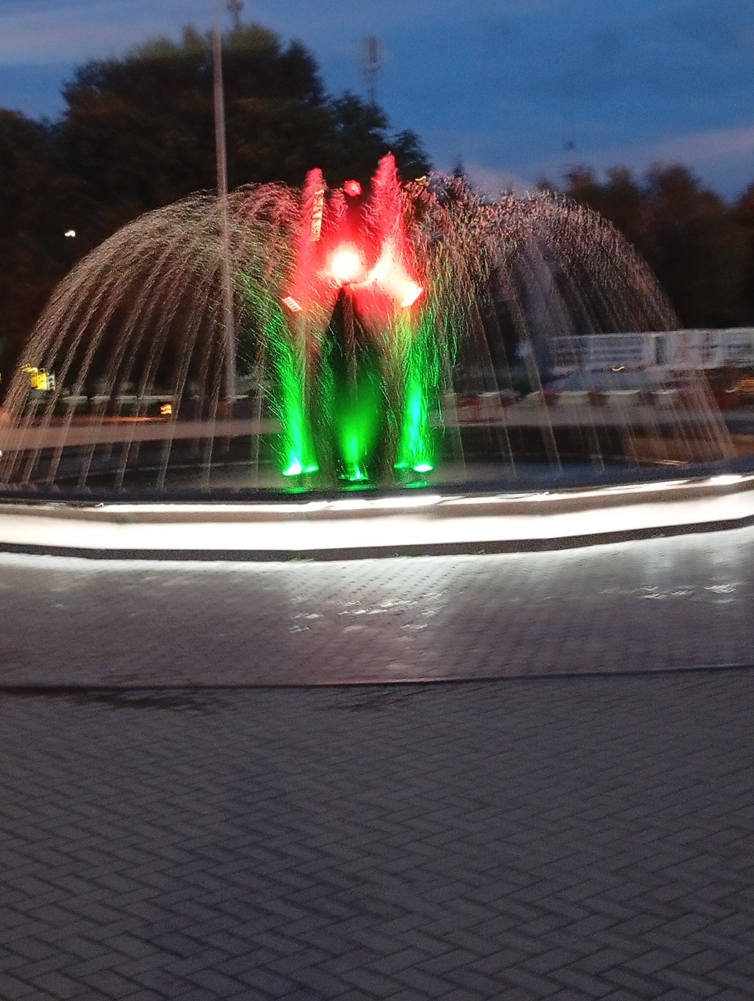 Colorful fountain lights up the evening in Pokrov, Ukraine