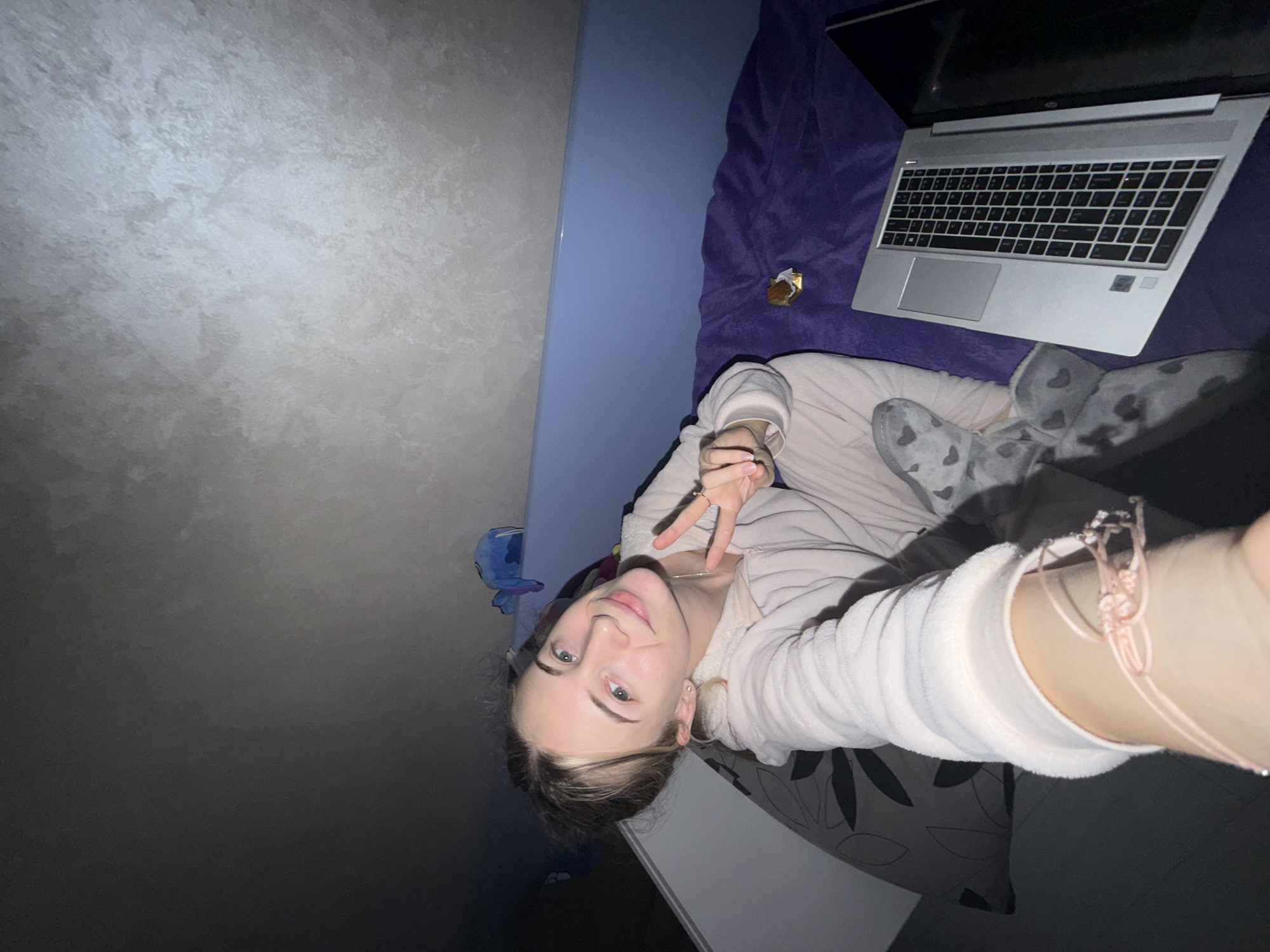 Young couple takes playful selfies indoors in Plovdiv