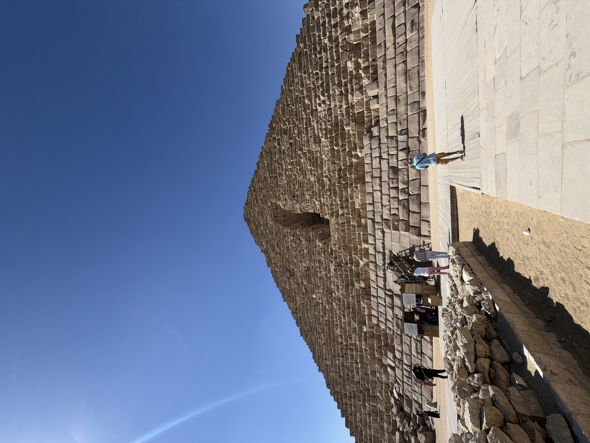 Morning at the Giza pyramids: stones, souvenirs, and camels