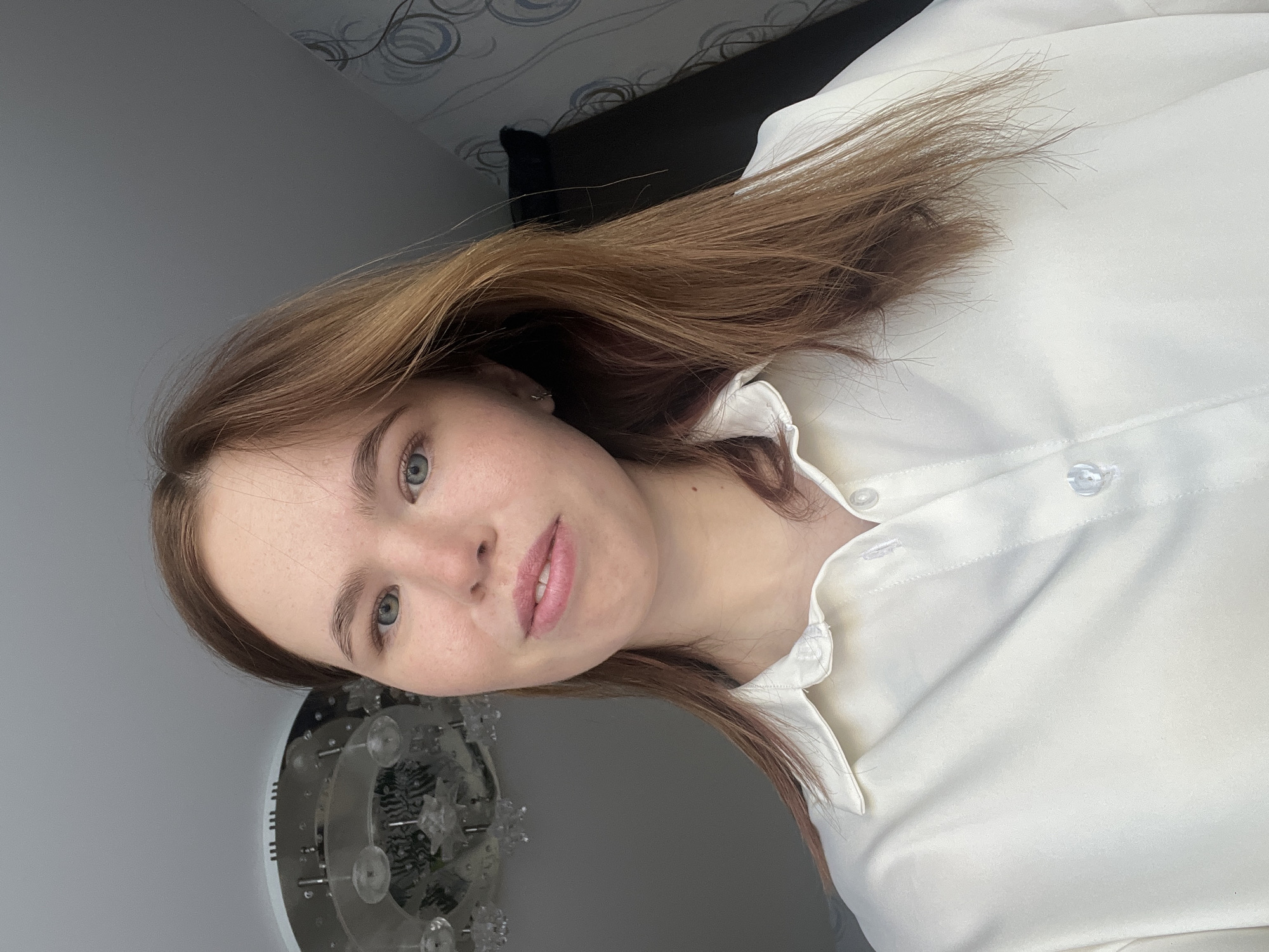 Woman documents morning routine with pet cat in Chaikovsky residence