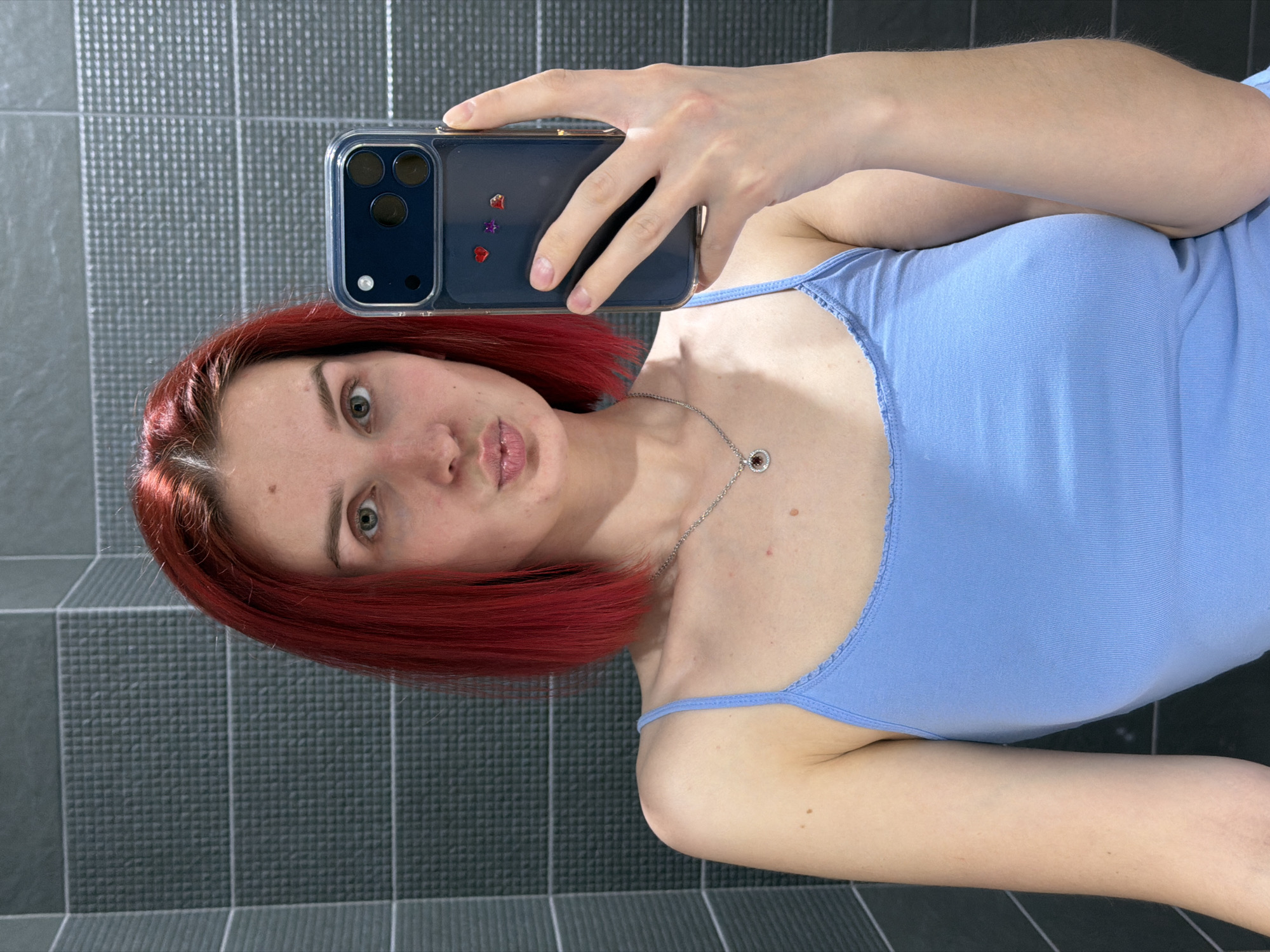 Woman takes selfies in bathroom in Chaikovsky, Russia