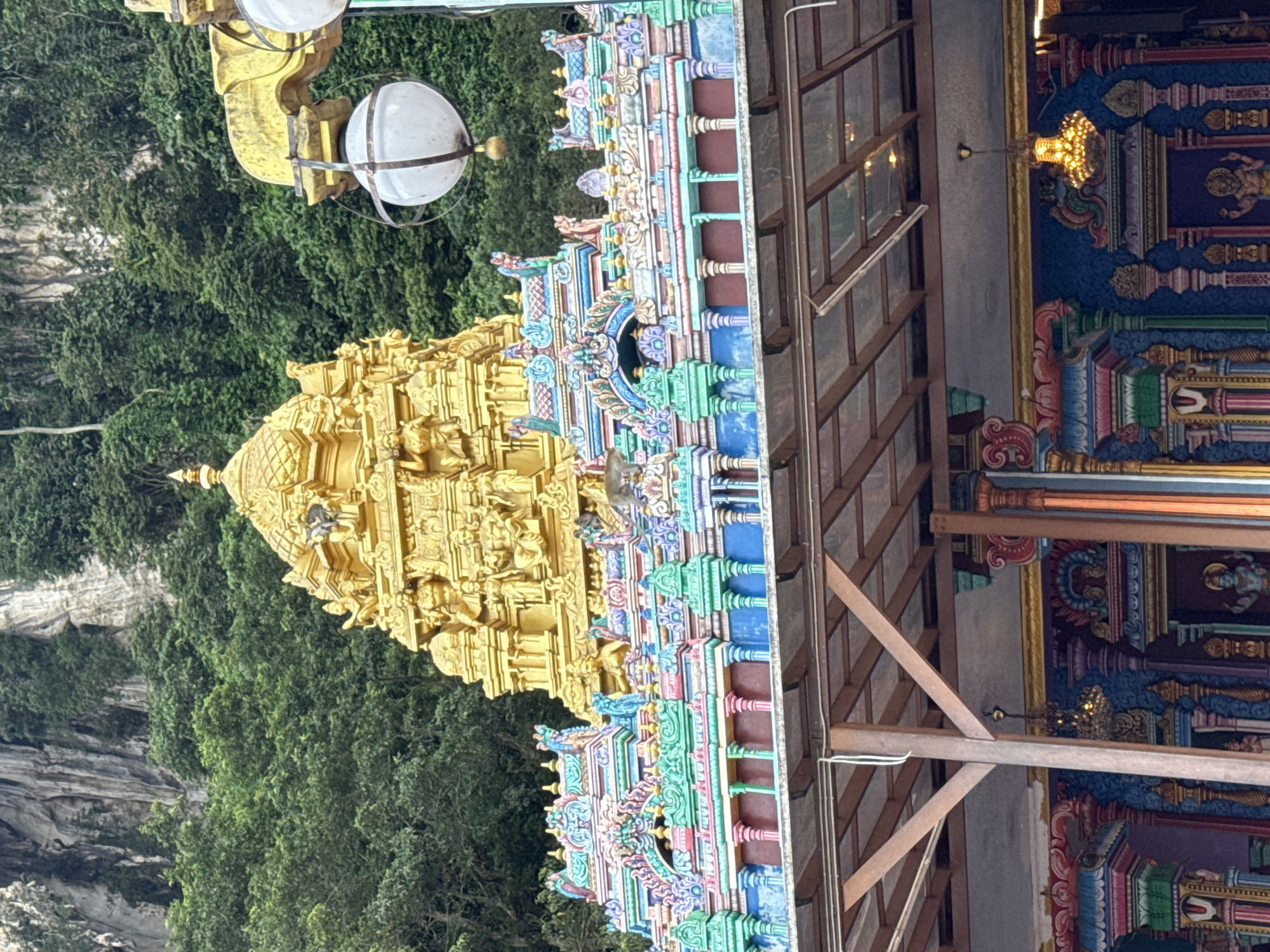 Monkeys interact with visitors at Malaysia's Batu Caves temple