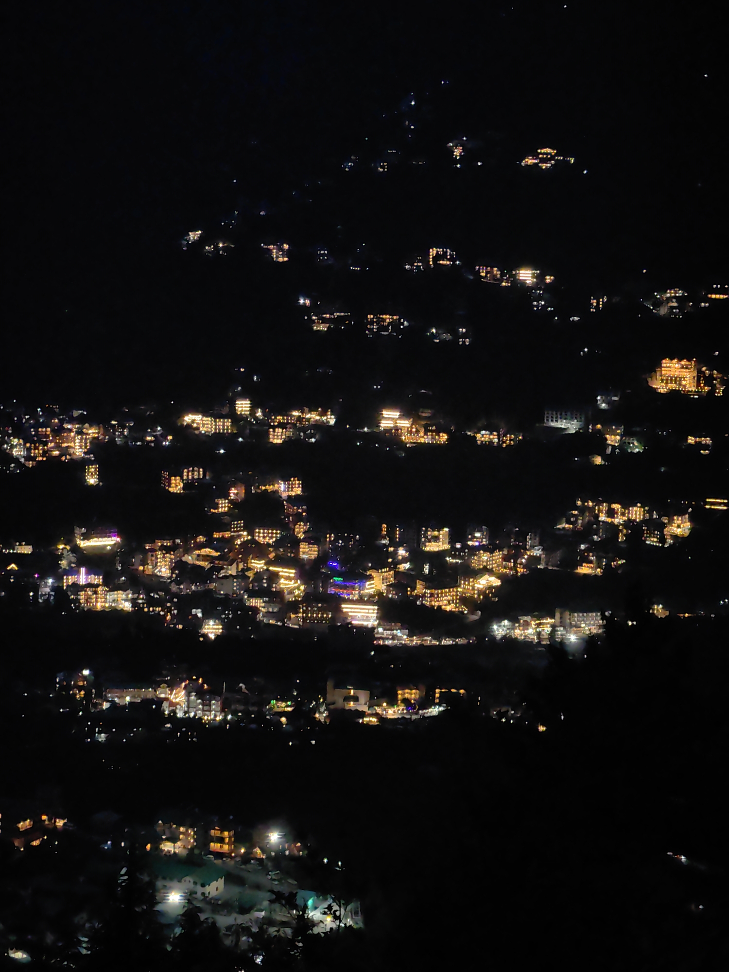 Hillside town of Prini glows at night in Himachal Pradesh