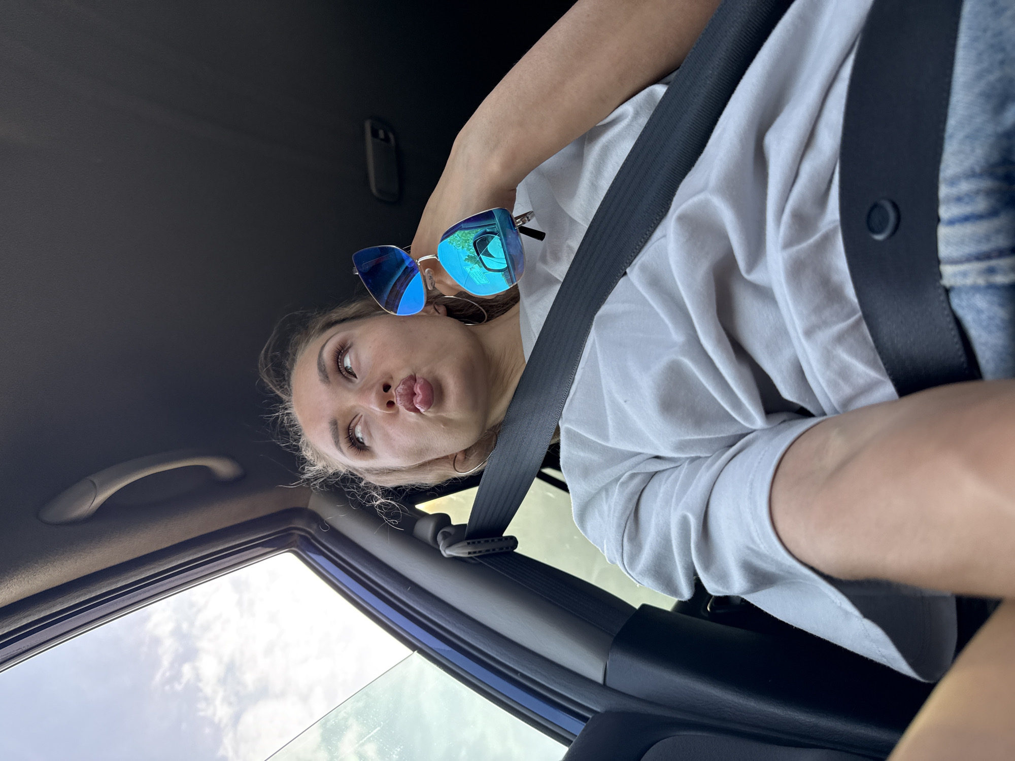Woman takes early morning car selfies in Chaikovsky