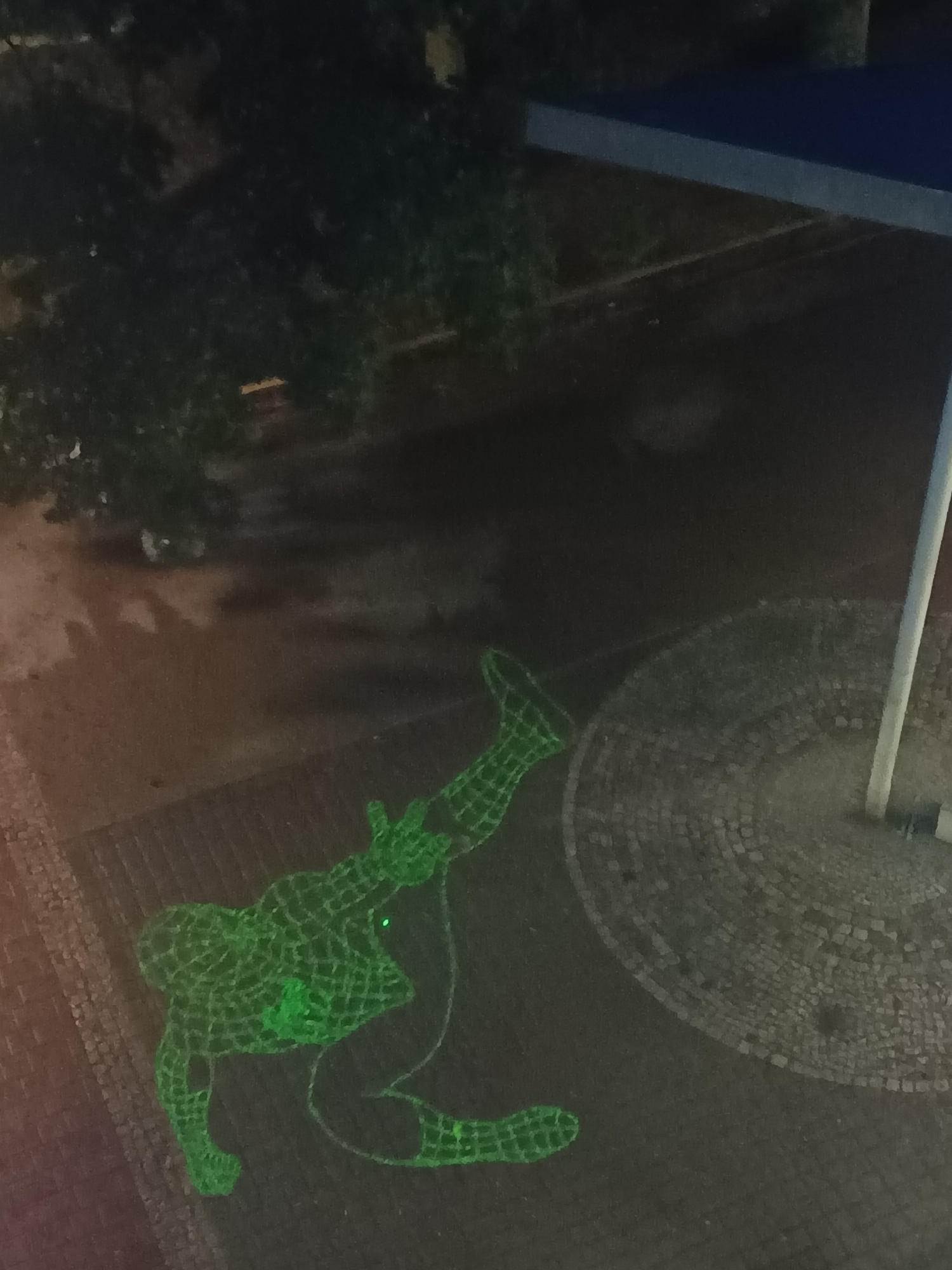 Green laser Spider-Man projection lights up Berlin surfaces at night