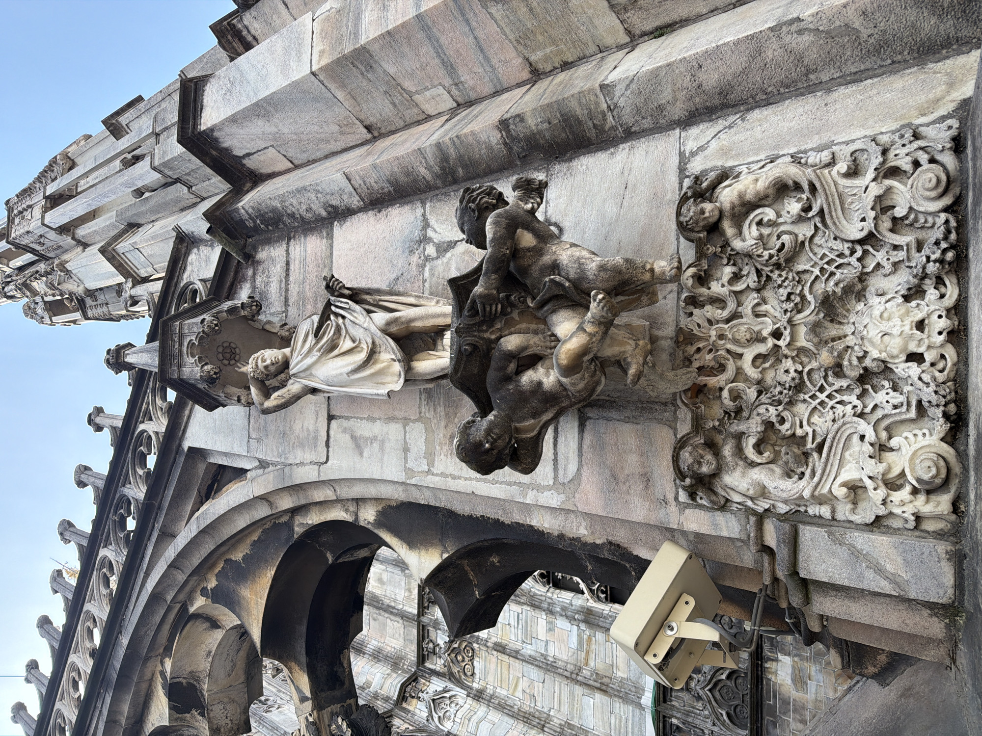 Morning tourism activity documented at Milan's Duomo cathedral