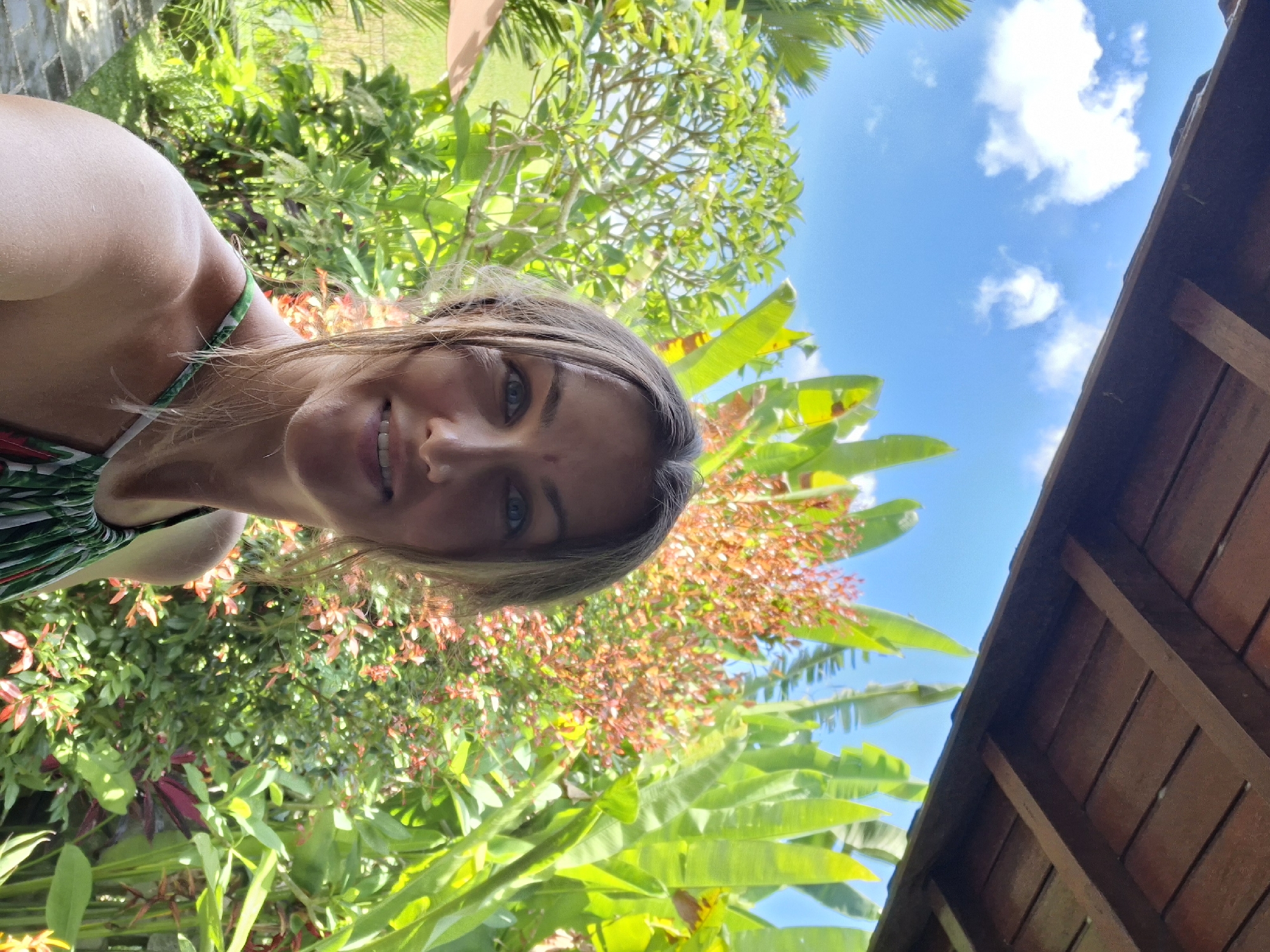 Woman photographed in tropical setting in Lodtunduh, Indonesia