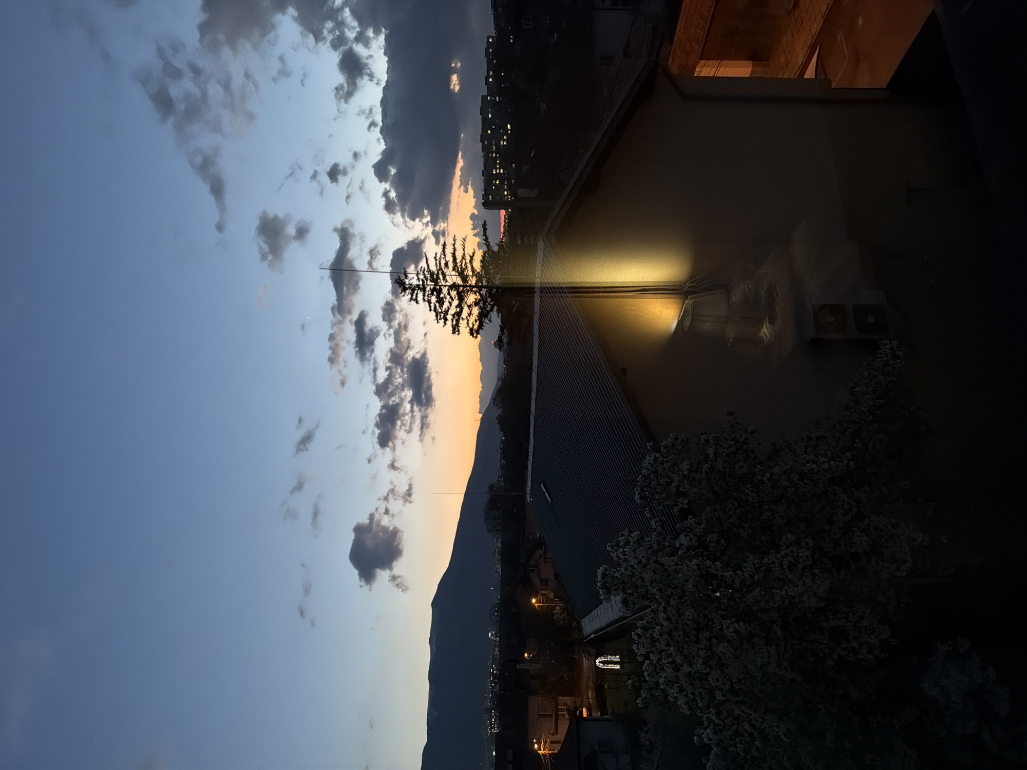 Evening sky transition observed over Sofia residential area