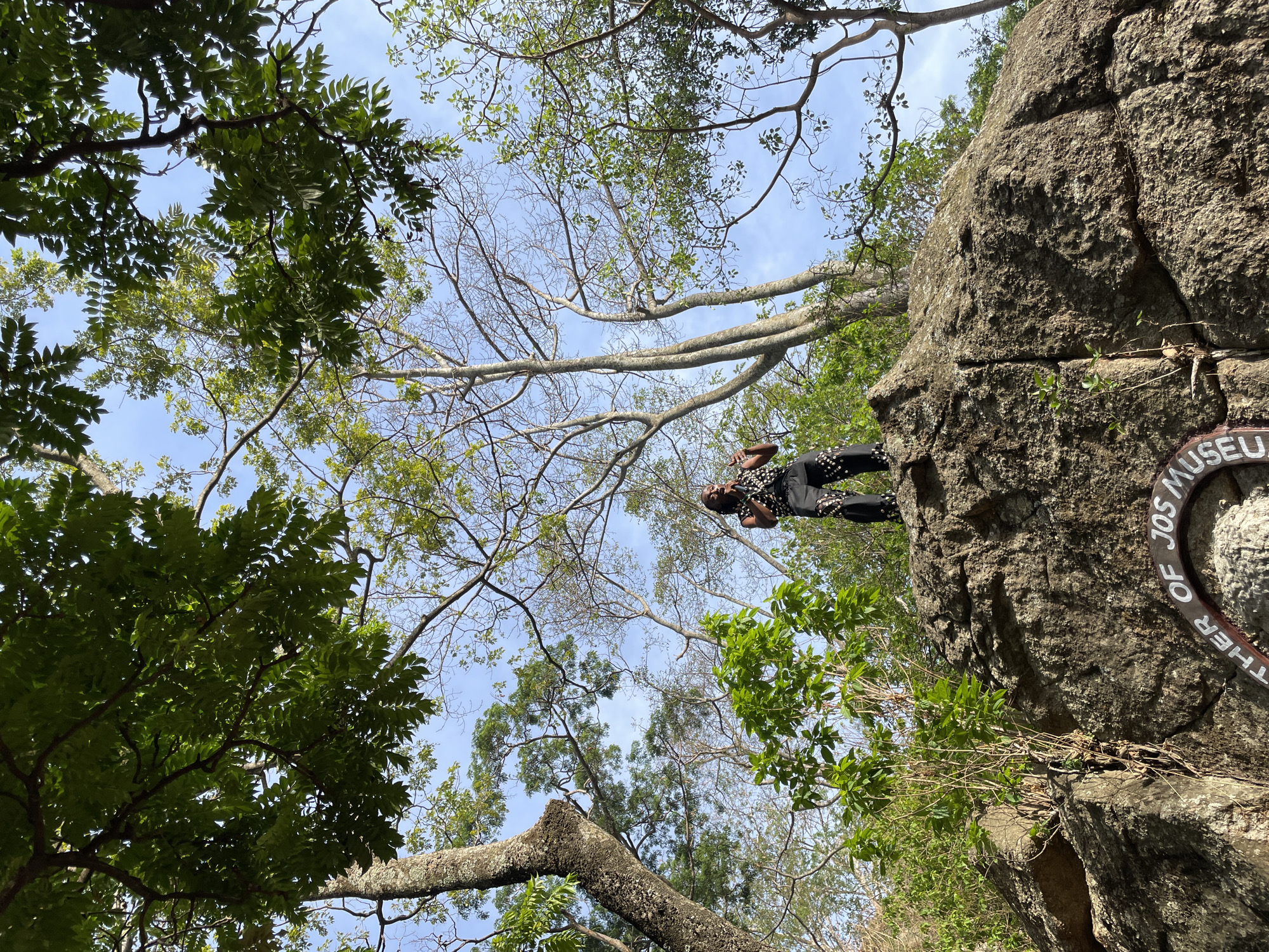 Visitors explore rocky landscape in Jos, Nigeria