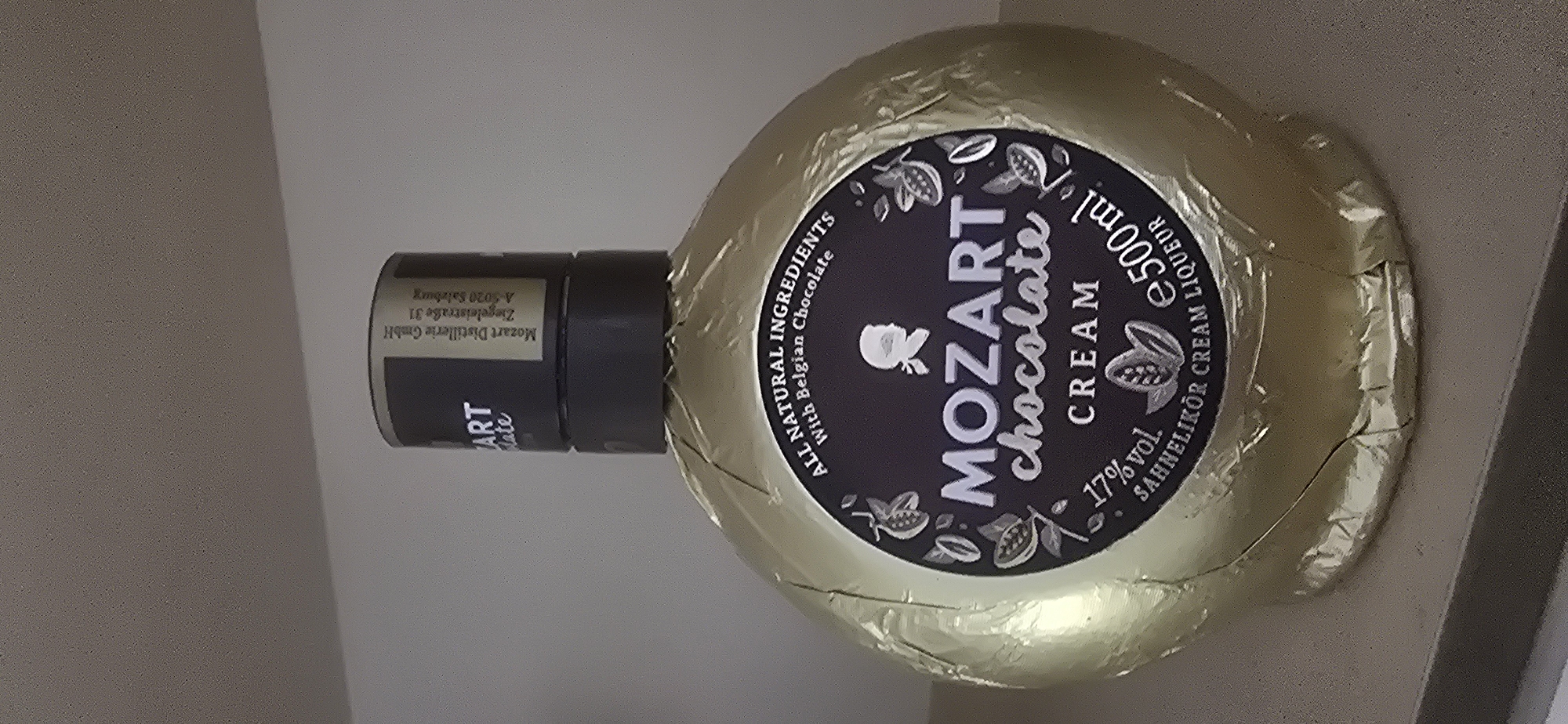Eight miniature spirits bottles from a minibar or travel haul