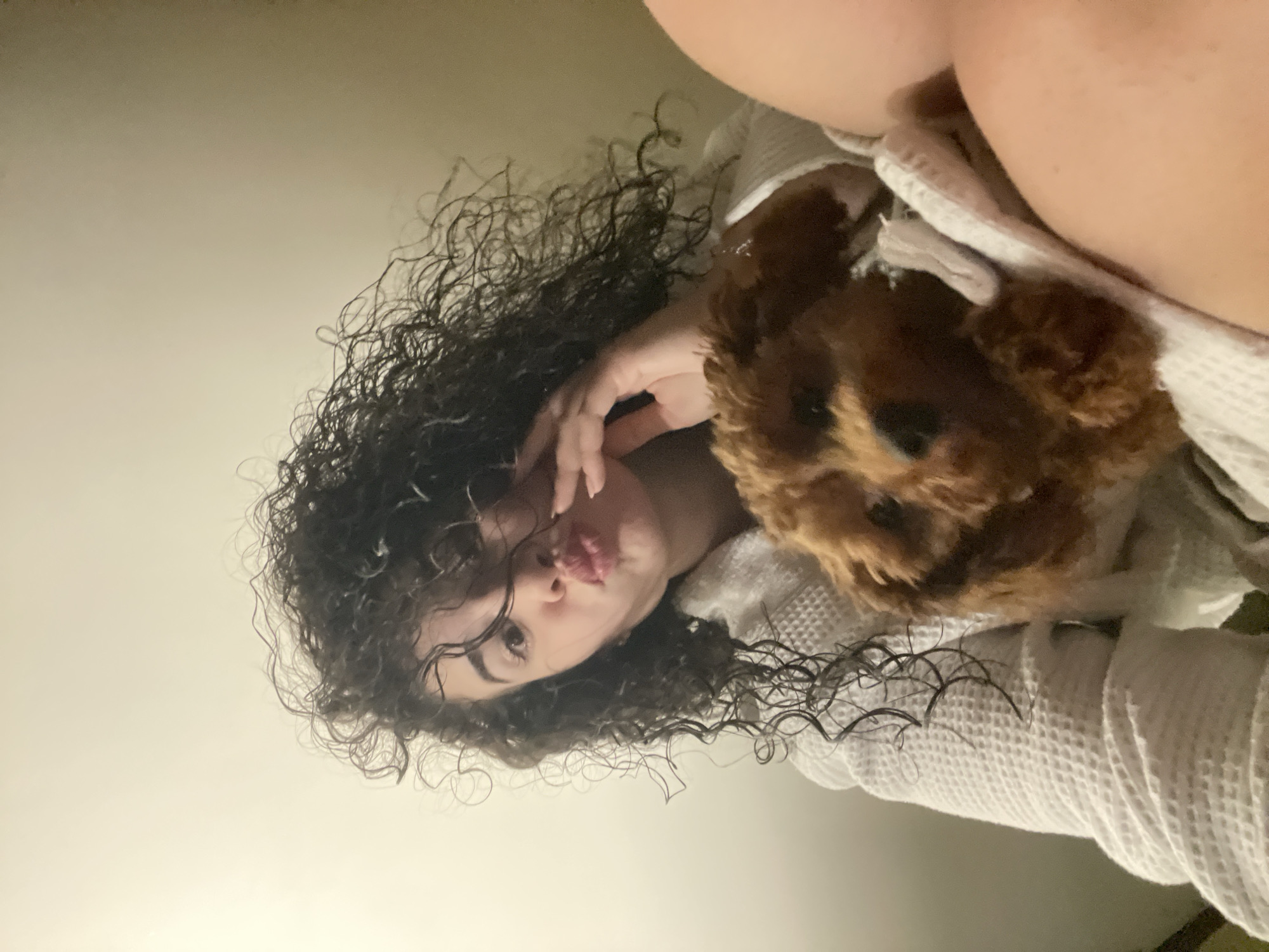Woman poses with brown poodle puppy in Sofia photoshoot