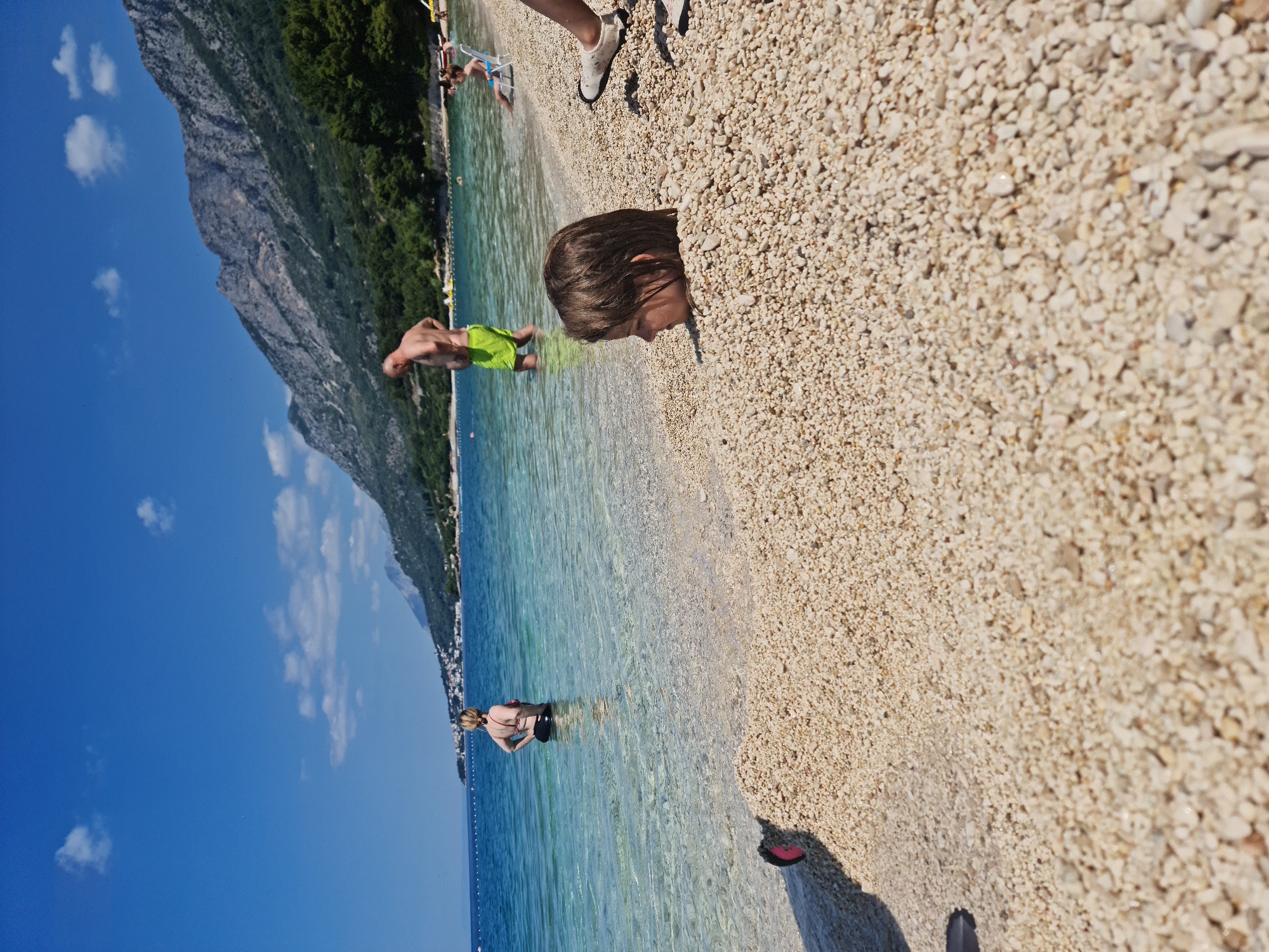 Quiet morning on a pebble beach in coastal Croatia