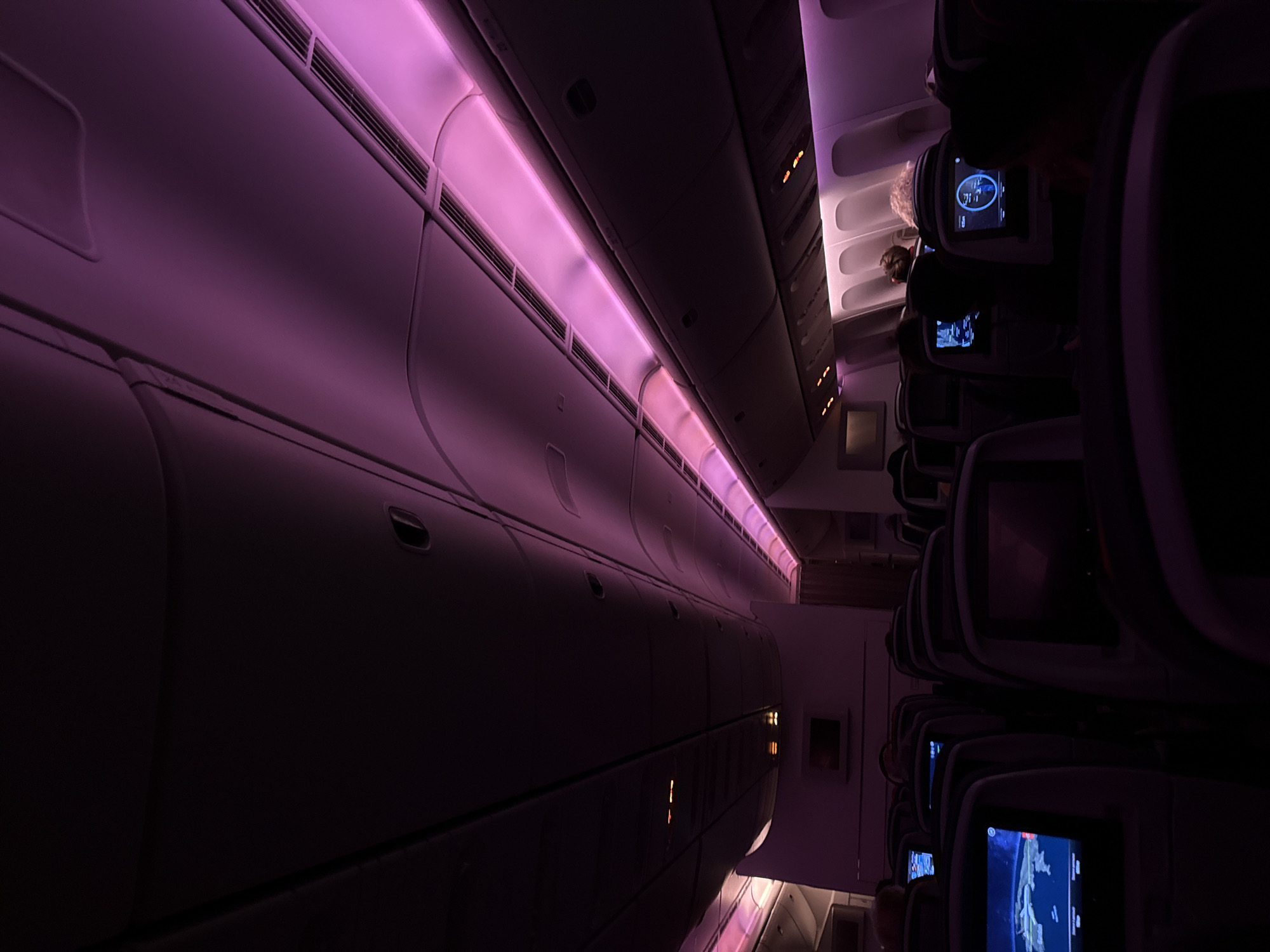 Aircraft cabin interior documented in Clichy with purple lighting