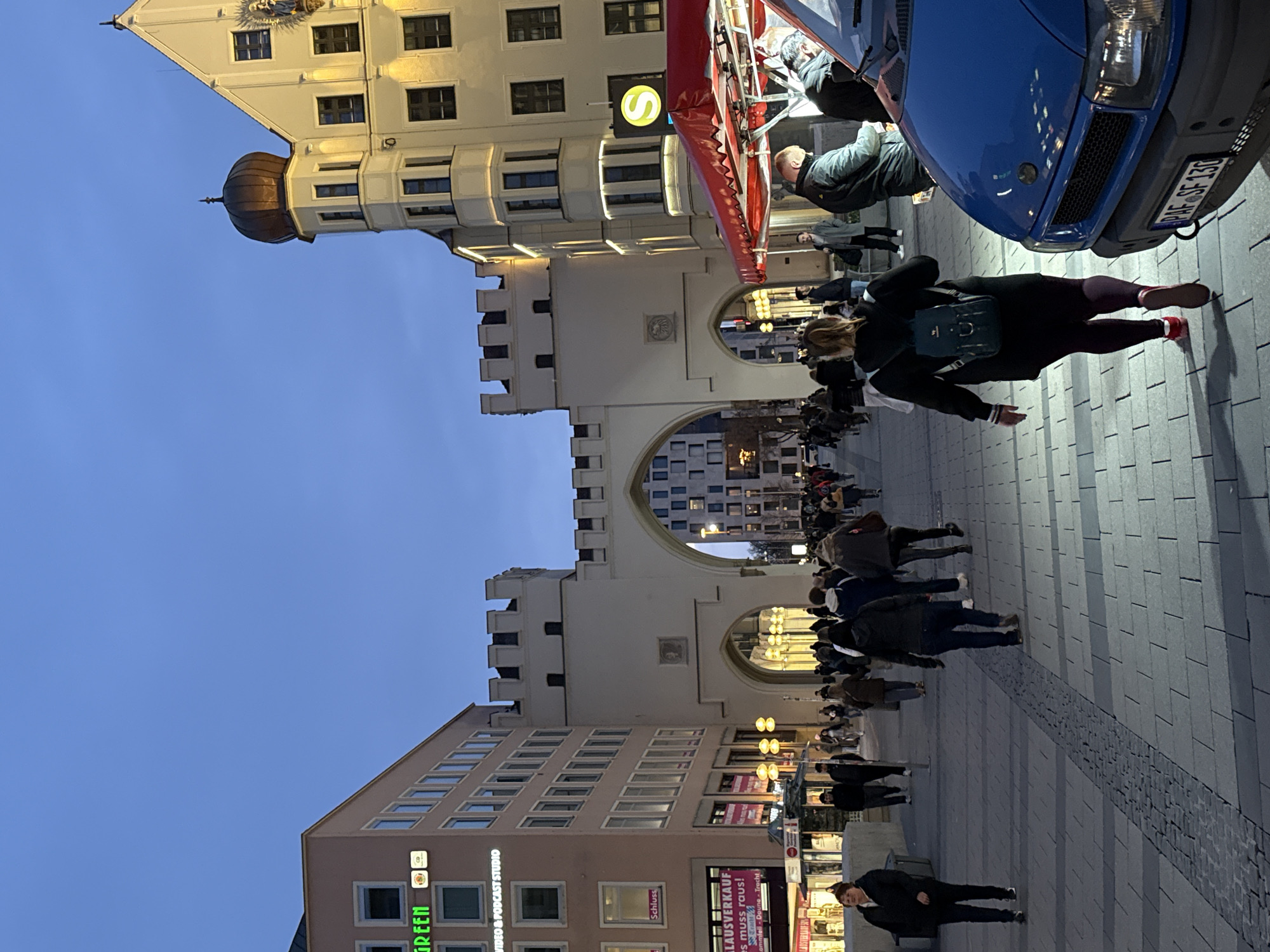 Evening pedestrian traffic observed near Munich's Karlstor