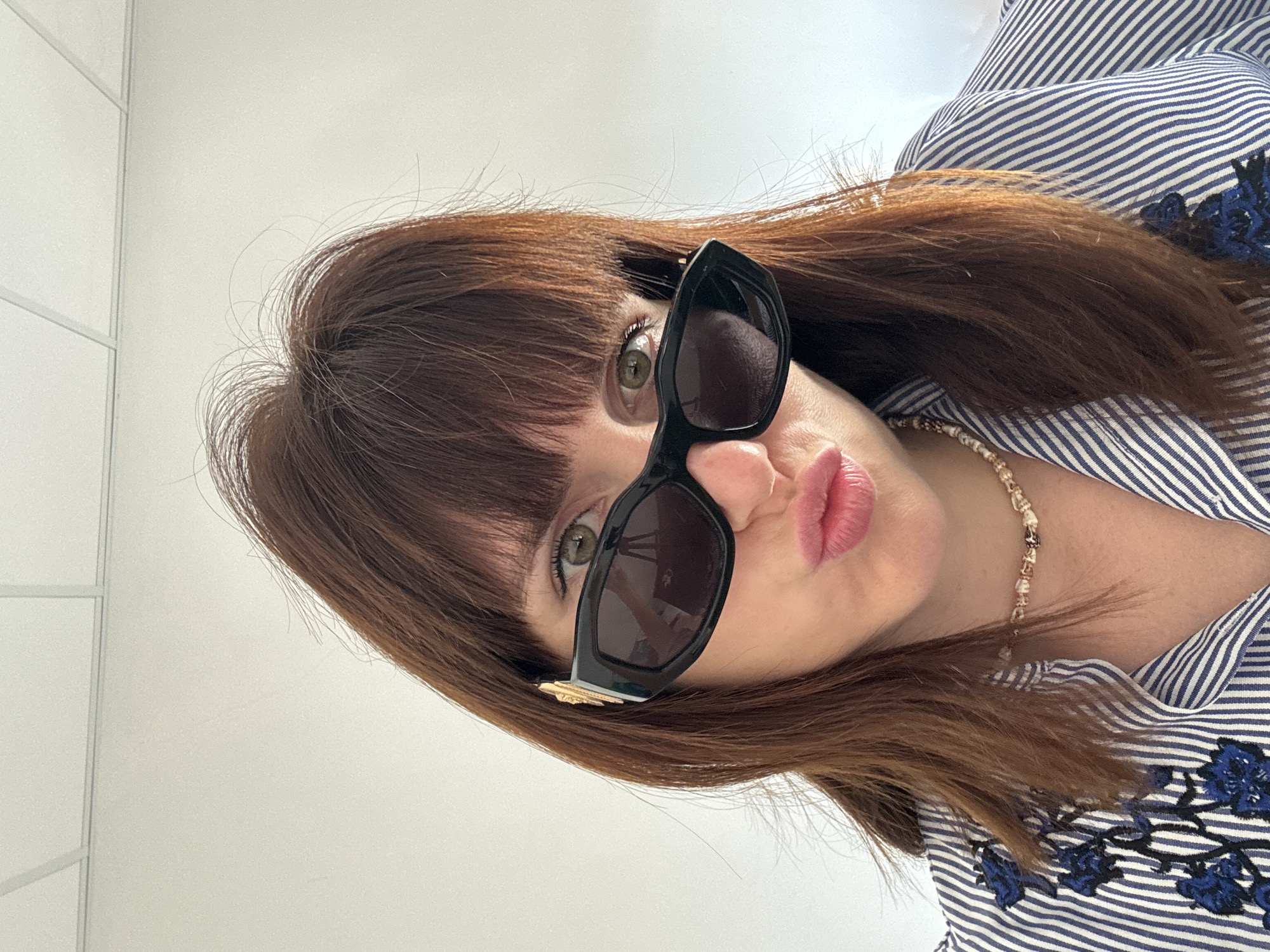 Matching sunglasses and stripes at Isola delle Femmine