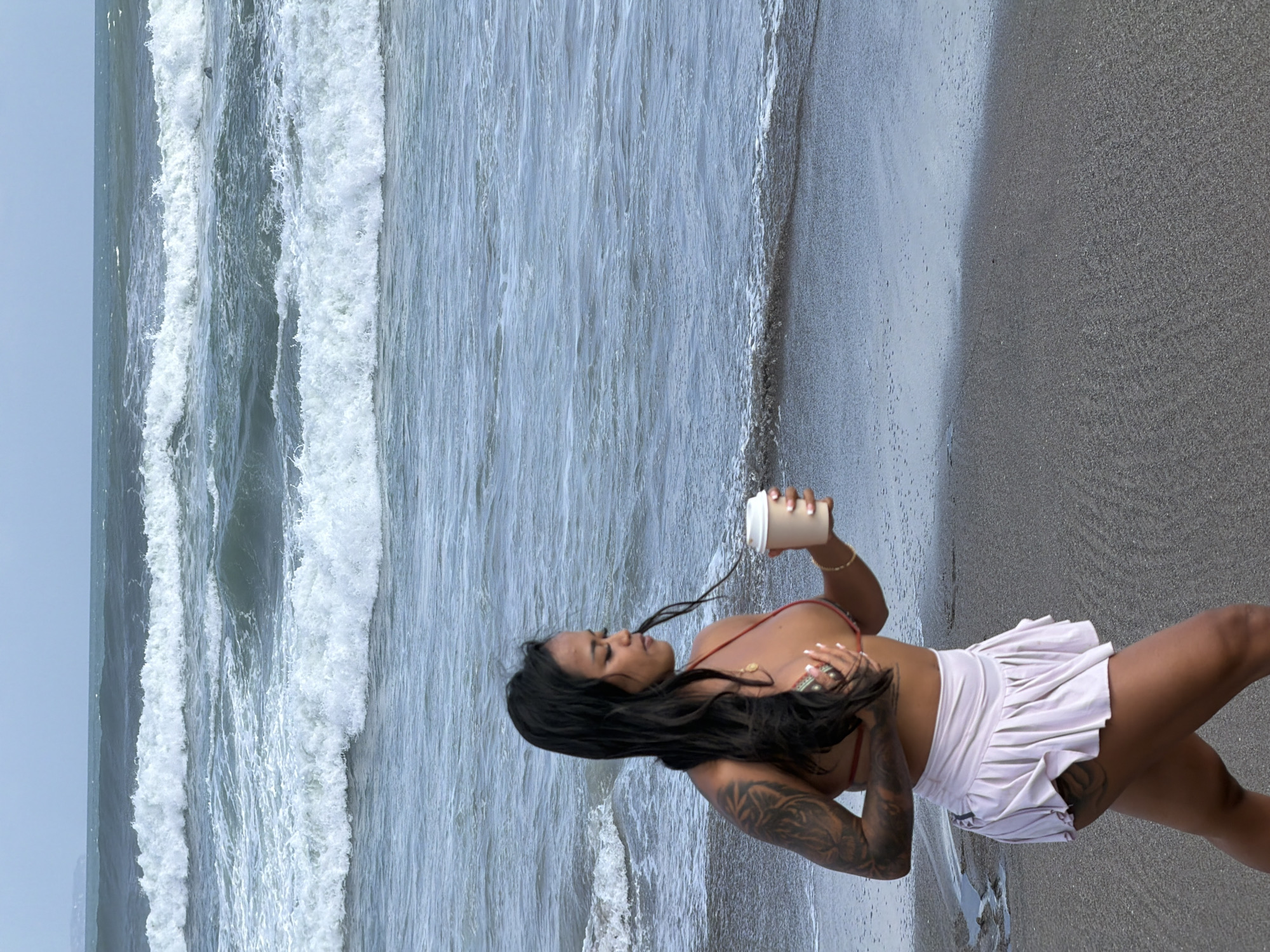 Morning activity along North Kuta's dark sand beach