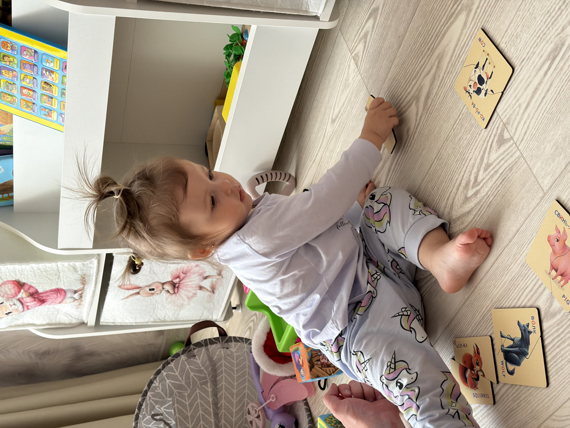 Morning routine captured: woman, toddler in Reshetnikovo home