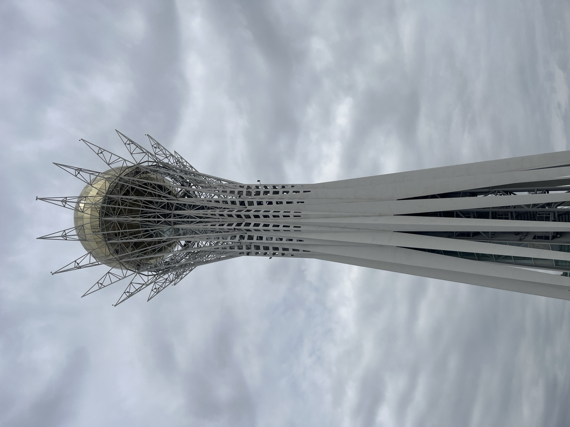 Bayterek Tower, Astana, under cloudy skies