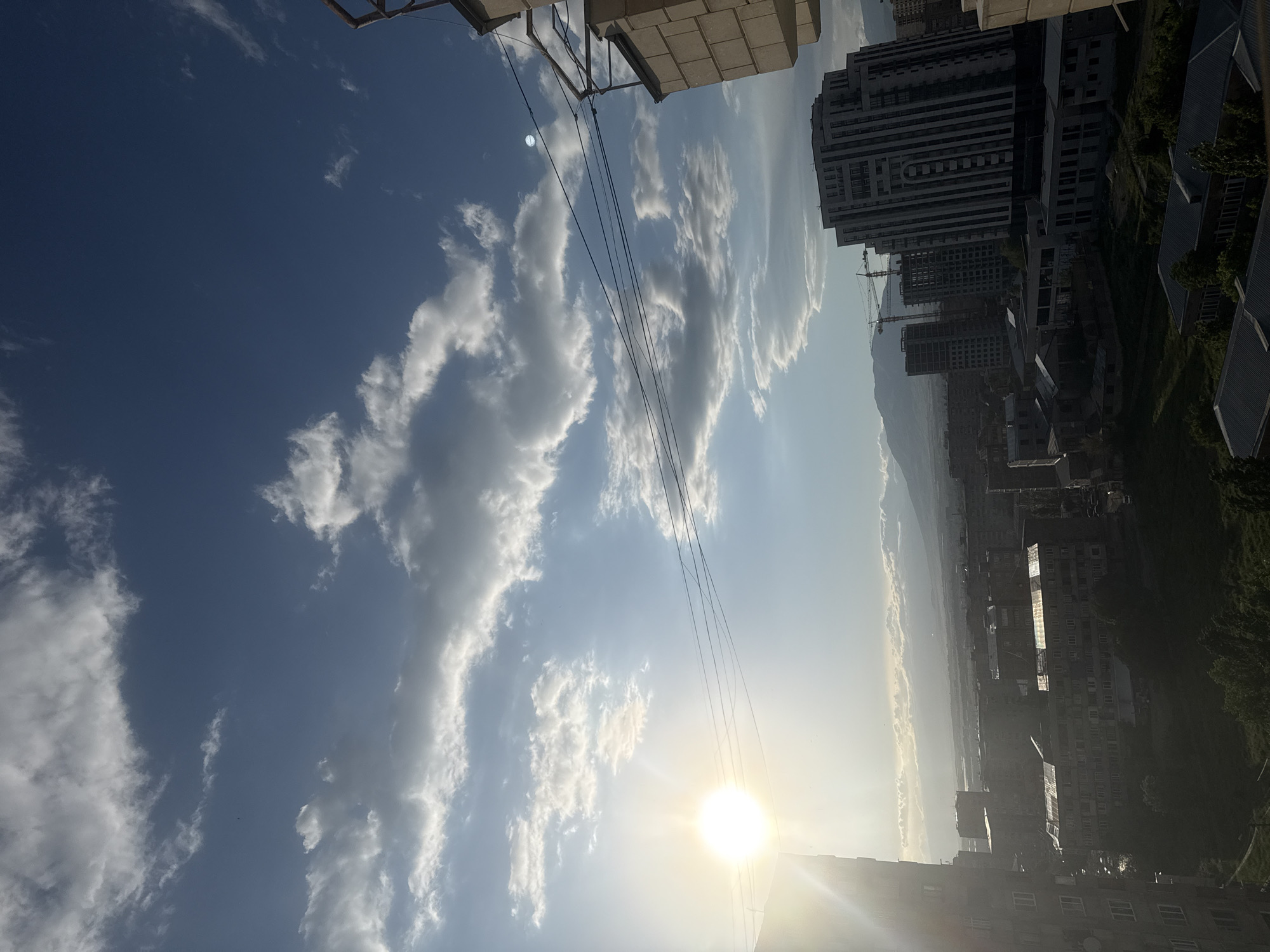 Witness documents sunny afternoon sky views from Abovyan balcony