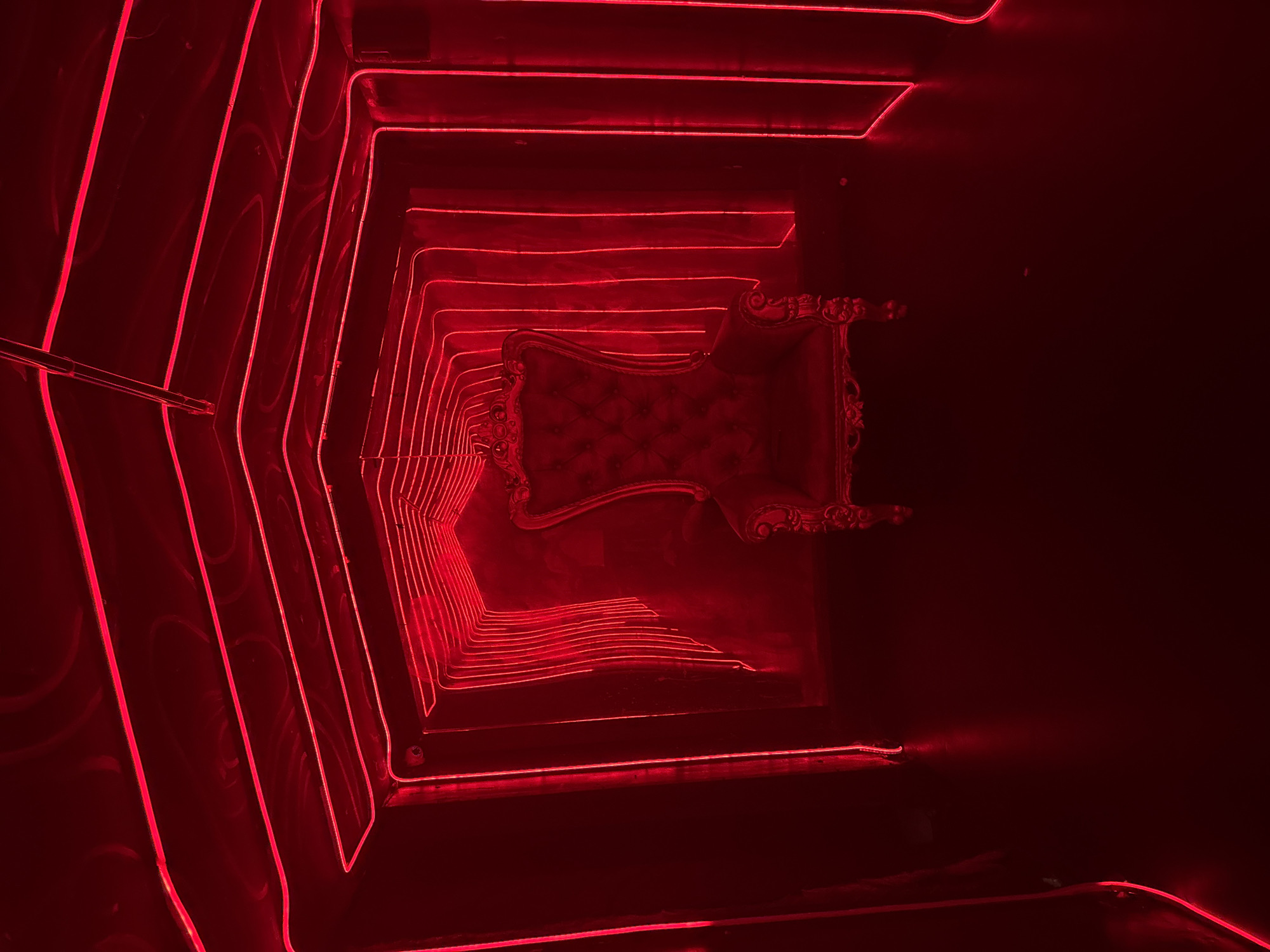 DJ performs with red laser show at North Kuta nightclub