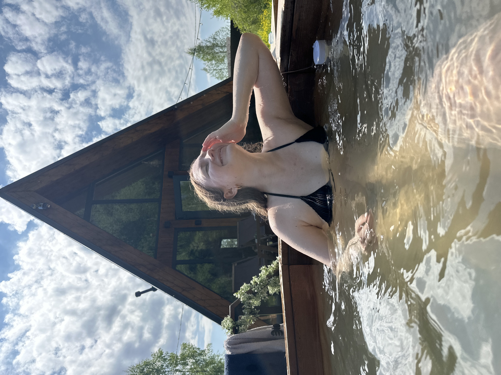 Couple enjoys intimate hot tub moment in Малеевка