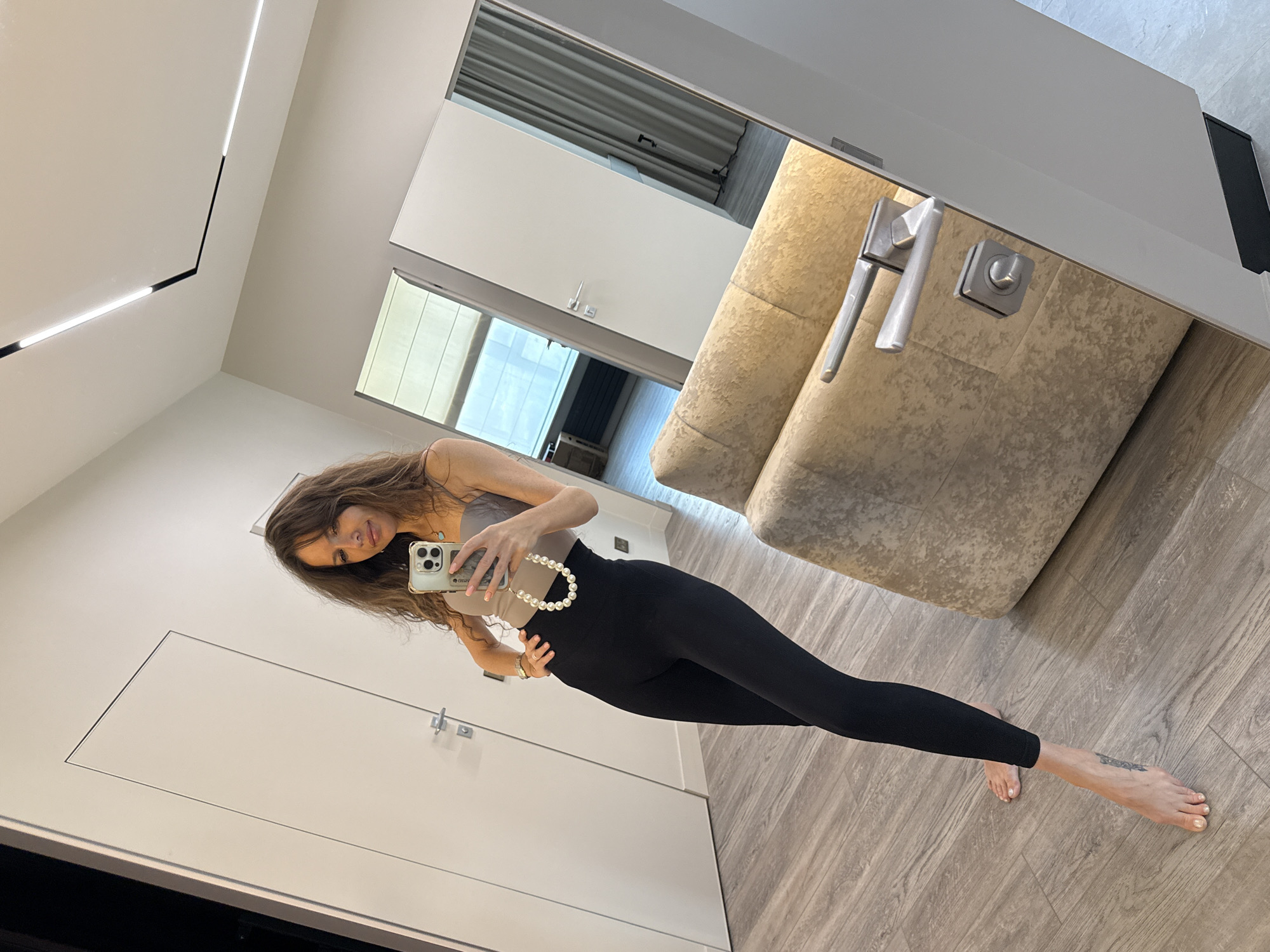 Mirror selfies in a Moscow building, minutes apart