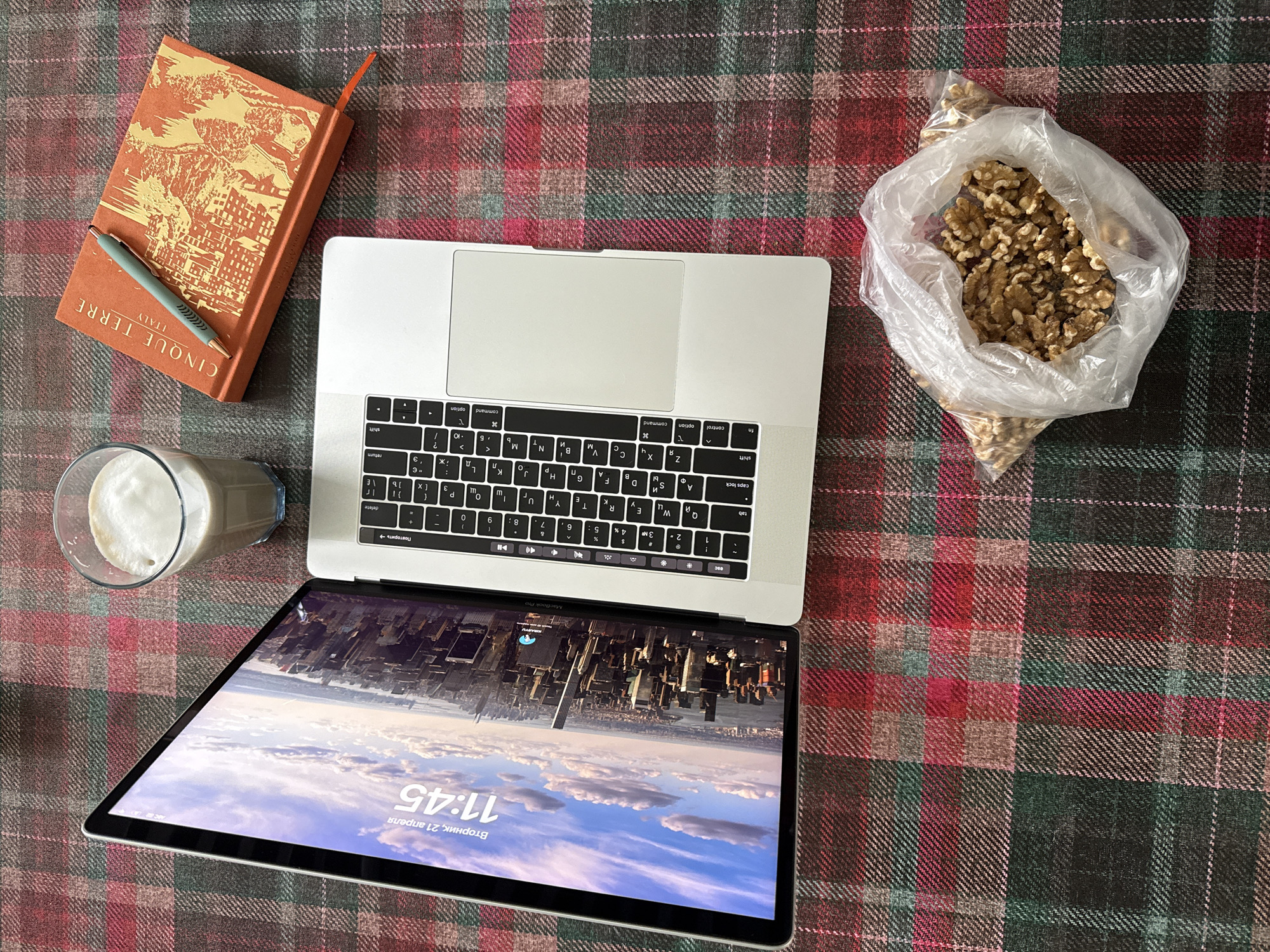 Evening moments captured: laptop display and blooming flowers in Coquitlam